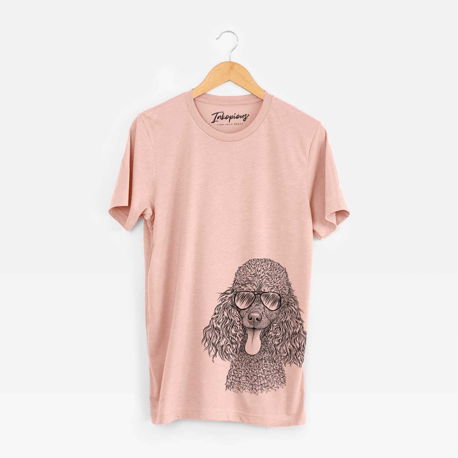 Hand-drawn sketch of Teddy the Mini Poodle wearing aviator sunglasses on a Peach Unisex crewneck