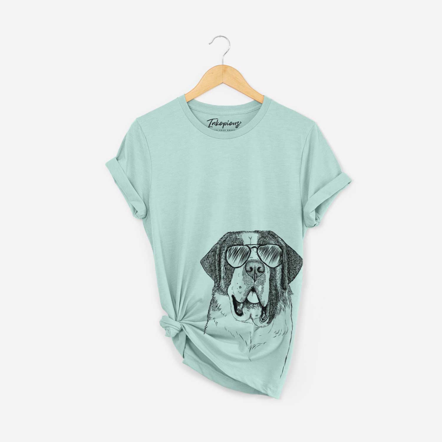 Hand-drawn sketch of Thor the Saint Bernard wearing aviator sunglasses on a Heather Sage Bella Canvas Unisex Crewneck
