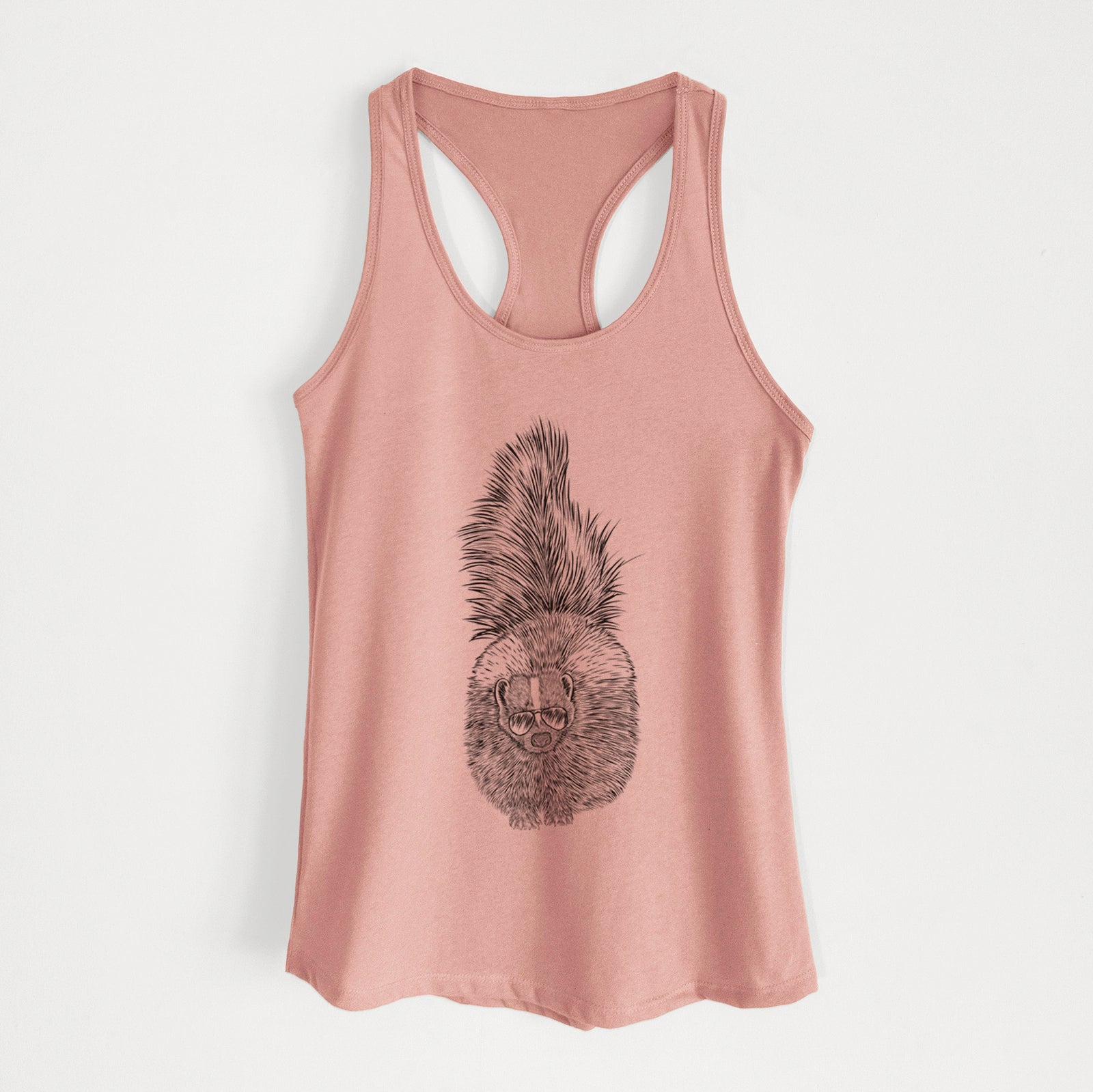 Hand-drawn sketch of Tibbs the Skunk wearing aviator sunglasses on a Desert Pink Women's racerback tanktop