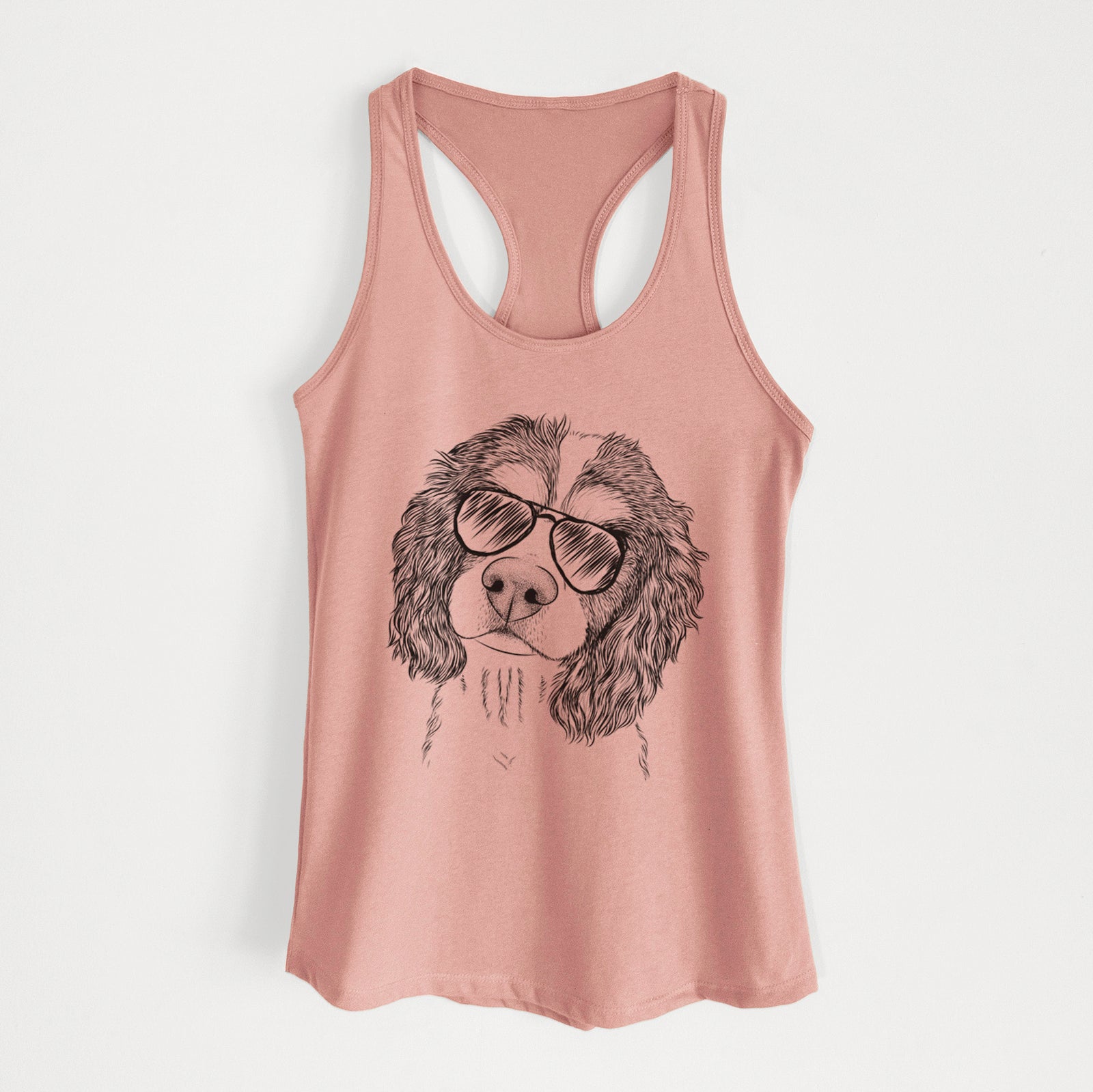 Hand-drawn sketch of Truman the Cavalier King Charles Spaniel wearing aviator sunglasses on a Desert Pink Women's racerback tanktop