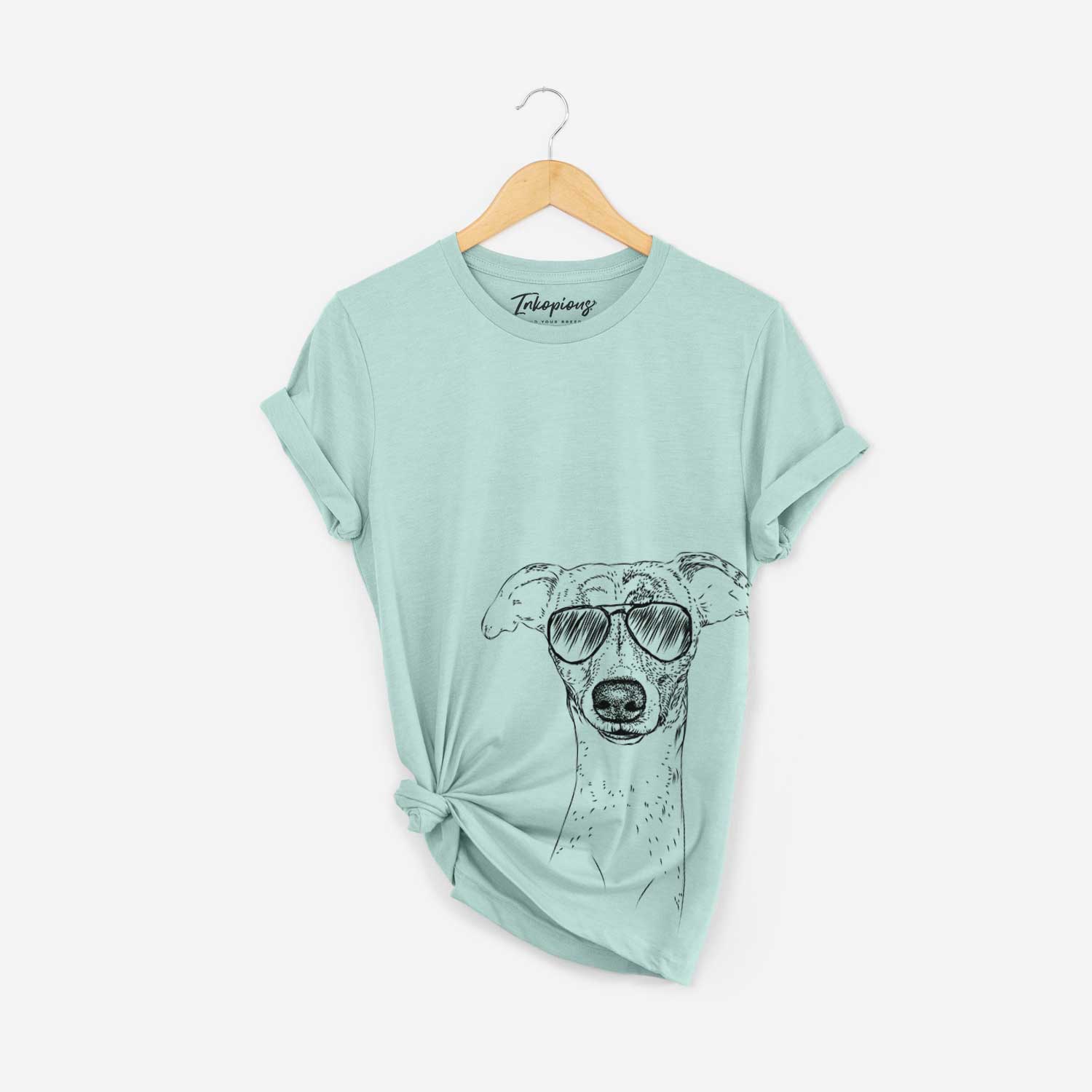 Hand-drawn sketch of Twiggy the Whippet wearing aviator sunglasses on a Heather Sage Bella Canvas Unisex Crewneck