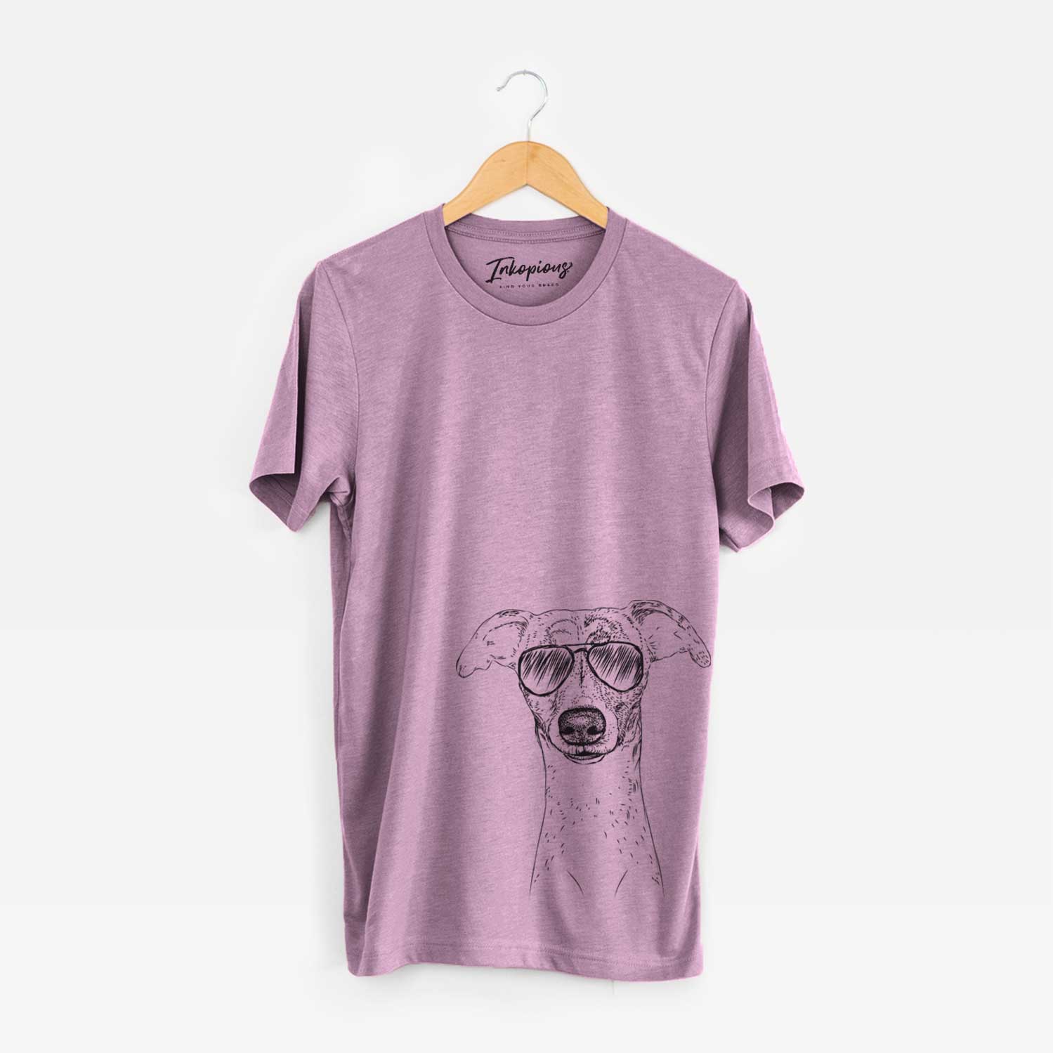 Hand-drawn sketch of Twiggy the Whippet wearing aviator sunglasses on an Orchid Unisex crewneck