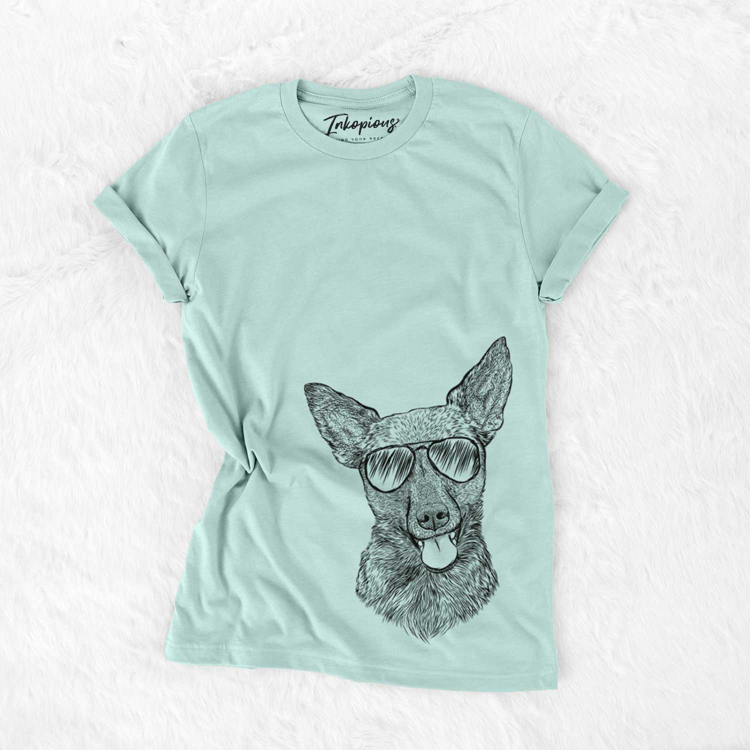 Hand-drawn sketch of Ursa the Mixed Breed wearing aviator sunglasses on a Heather Sage Unisex crewneck
