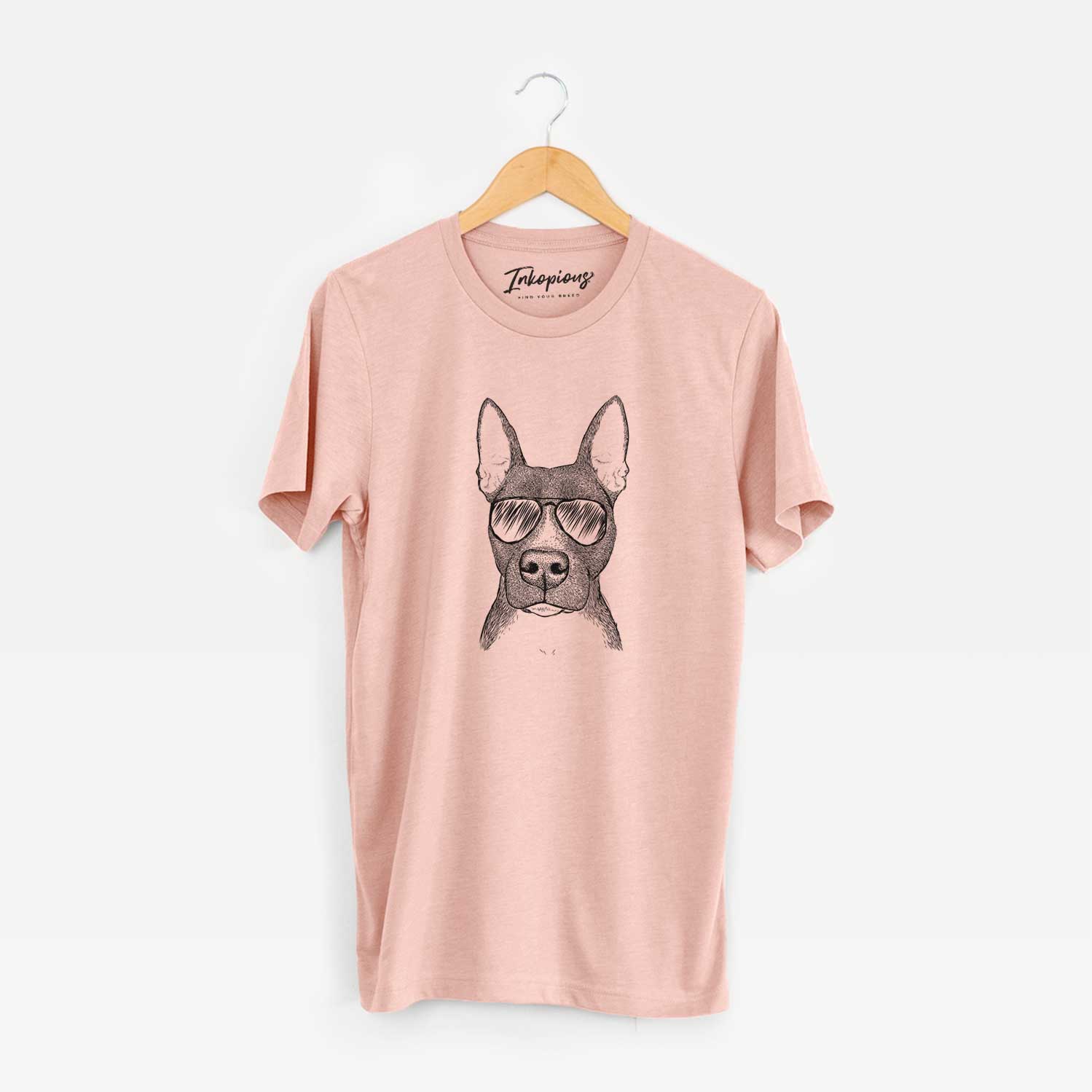 Hand-drawn sketch of Violet the Pitbull wearing aviator sunglasses on a Peach Unisex crewneck