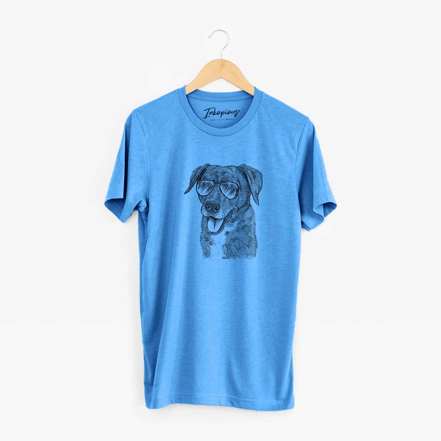 Hand-drawn sketch of Wally the Mixed Breed wearing aviator sunglasses on a Blue Unisex crewneck