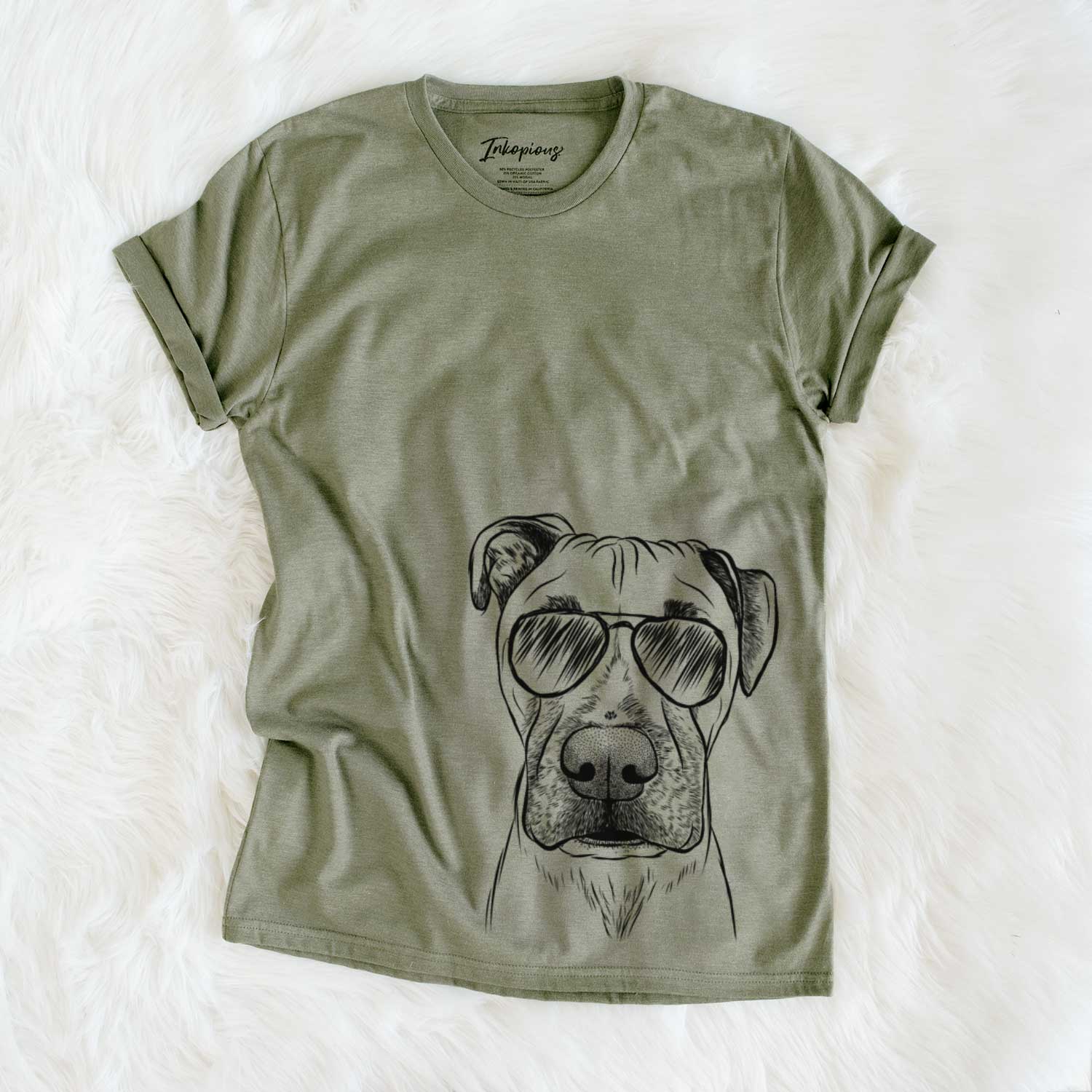 Hand-drawn sketch of Waylon the Boxane wearing aviator sunglasses on an Olive Unisex crewneck
