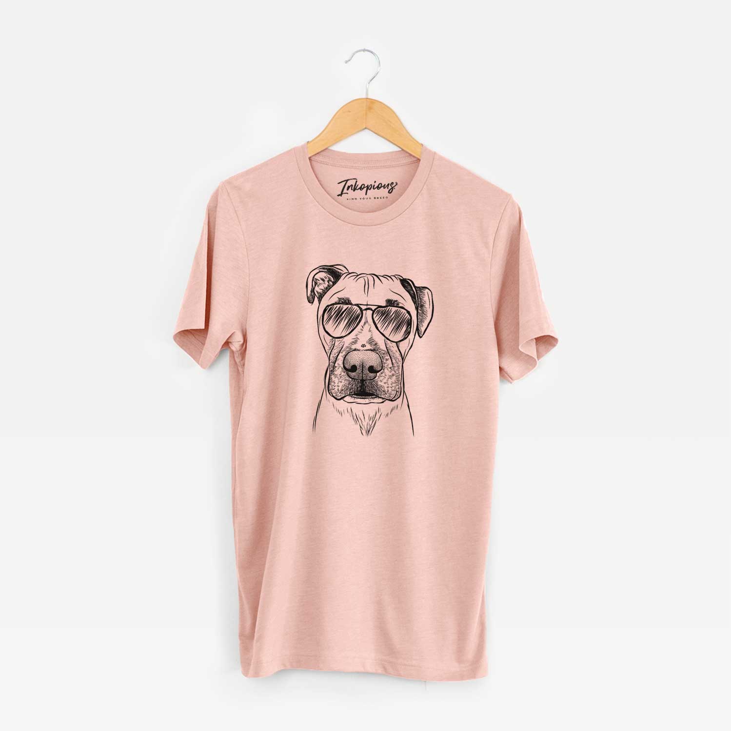 Hand-drawn sketch of Waylon the Boxane wearing aviator sunglasses on a Peach Unisex crewneck