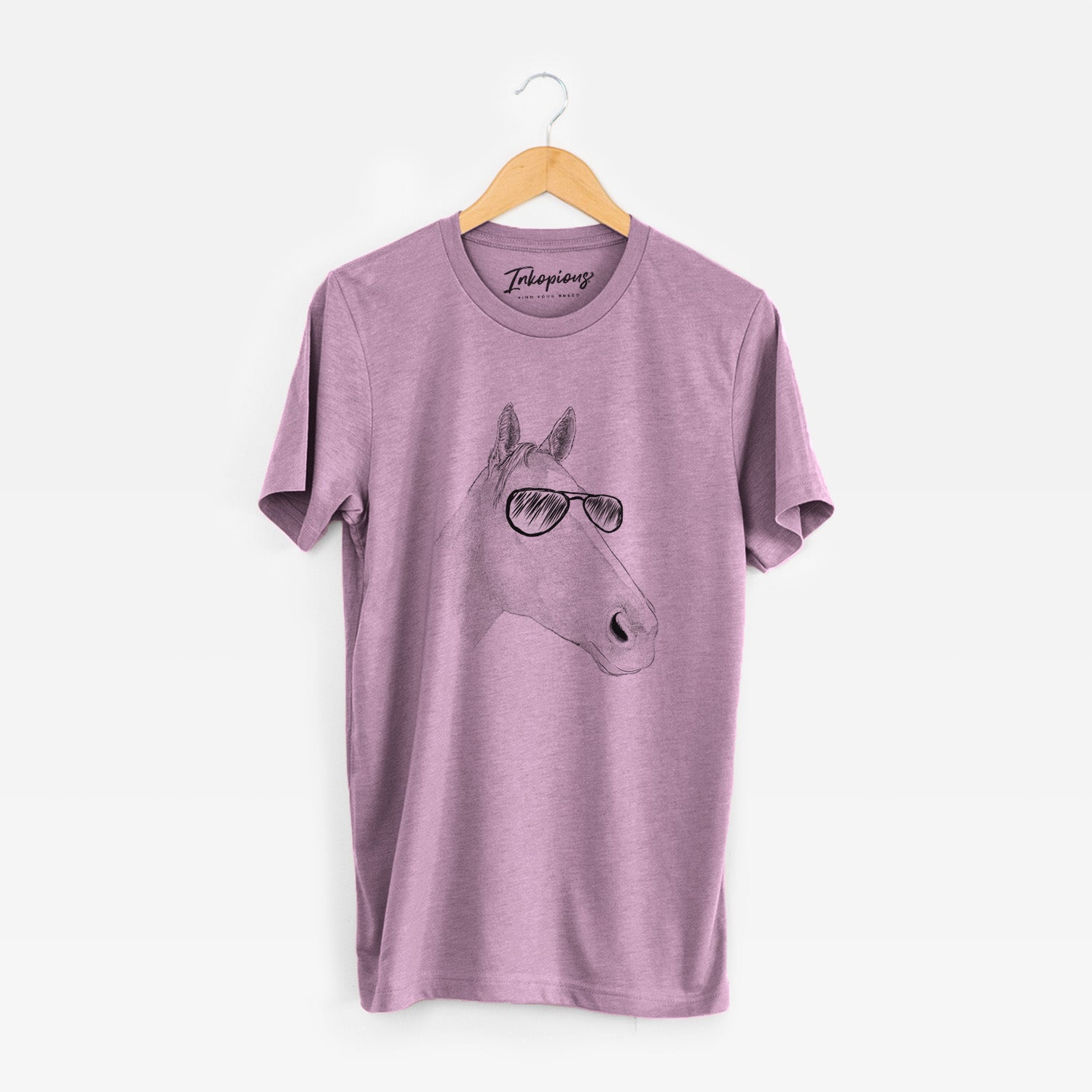 Hand-drawn sketch of Westley the Horse wearing aviator sunglasses on an Orchid Unisex crewneck