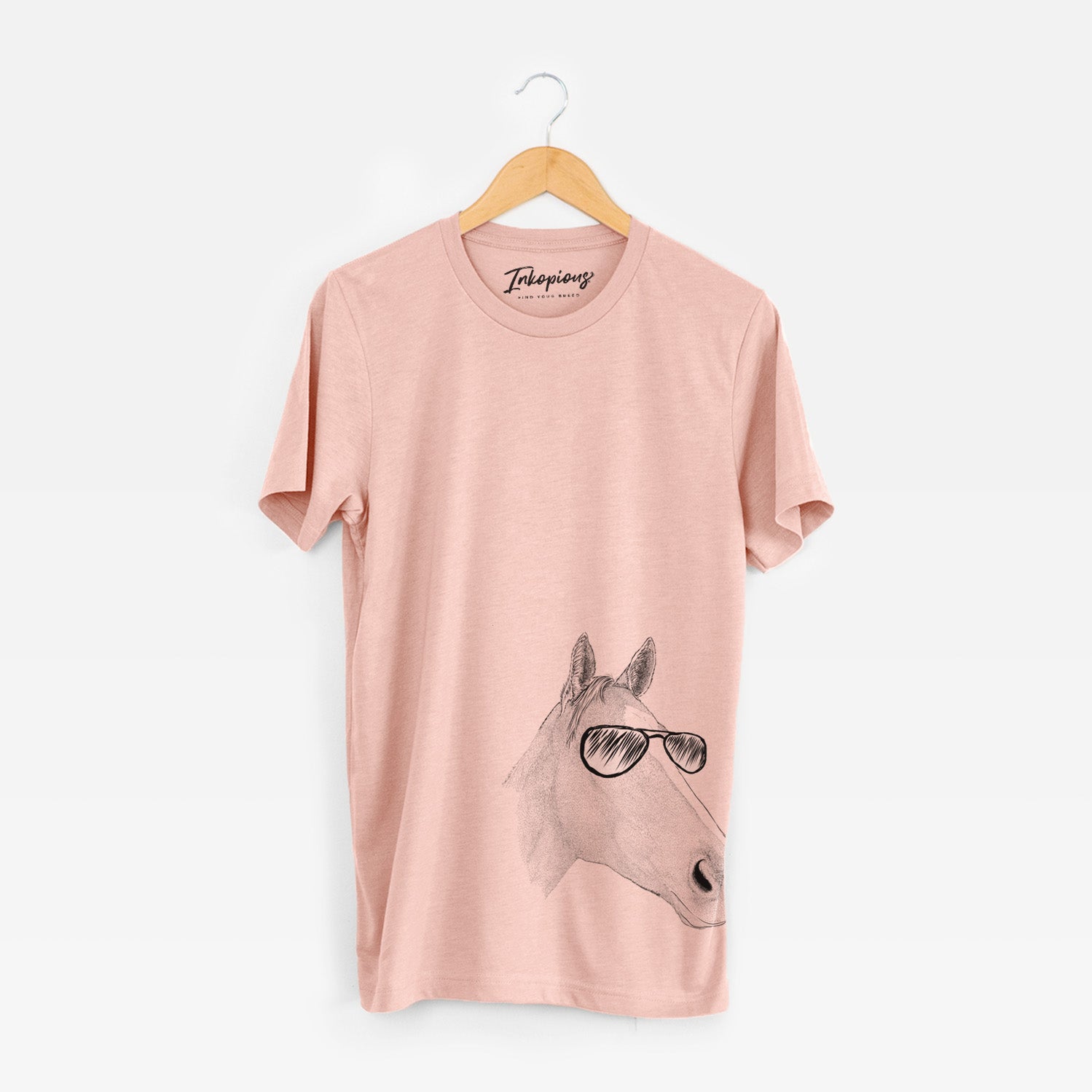 Hand-drawn sketch of Westley the Horse wearing aviator sunglasses on a Peach Unisex crewneck