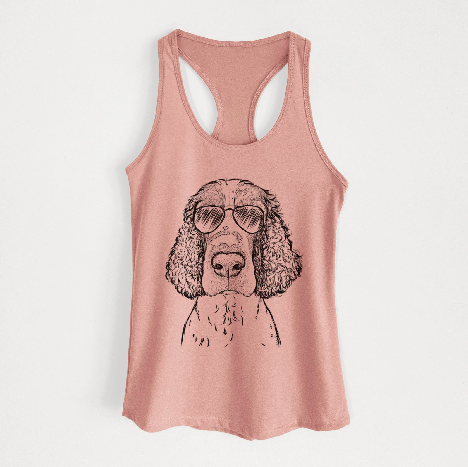 Hand-drawn sketch of Wilbur the English Springer Spaniel wearing aviator sunglasses on a Desert Pink Women's racerback tanktop
