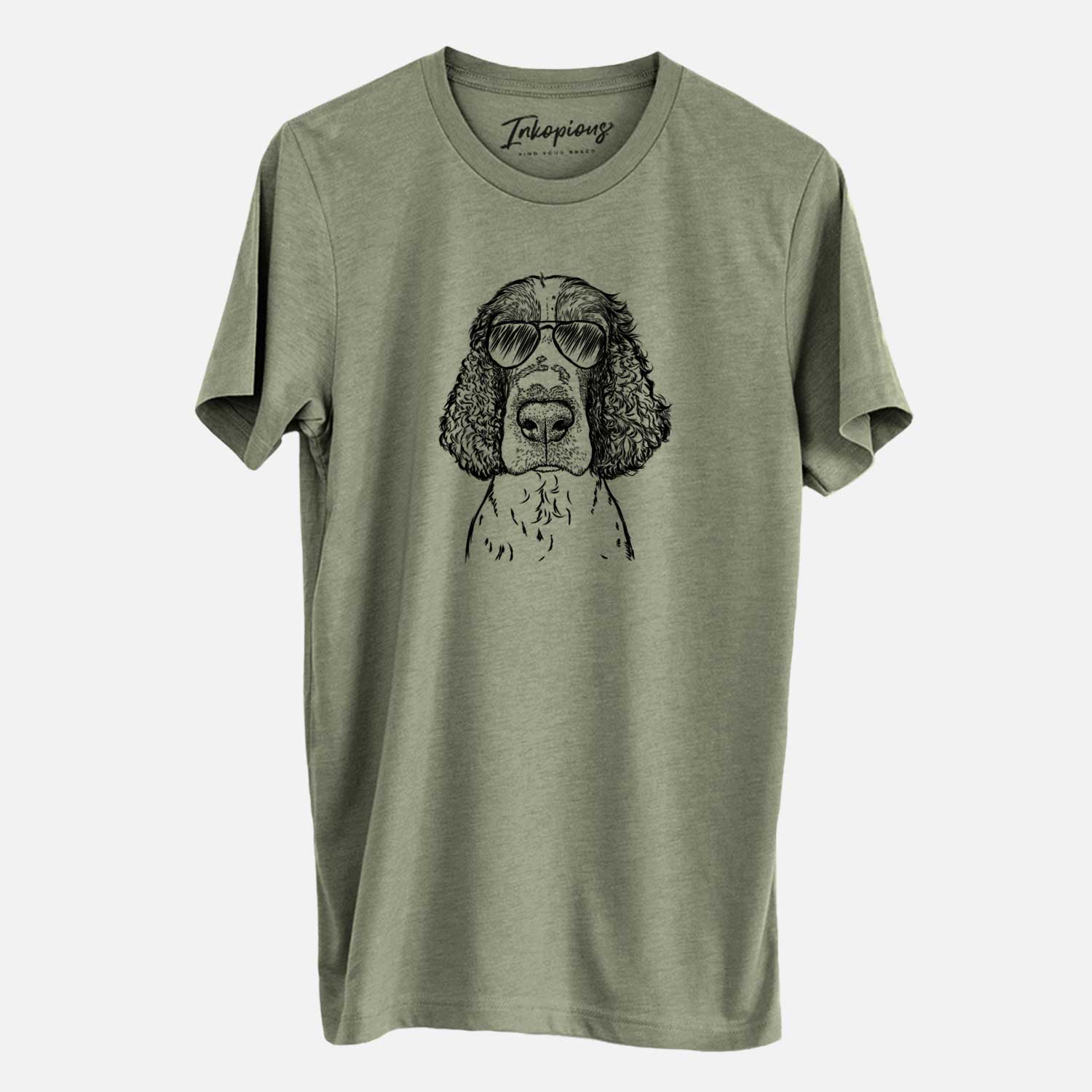 Hand-drawn sketch of Wilbur the English Springer Spaniel wearing aviator sunglasses on an Olive Unisex crewneck