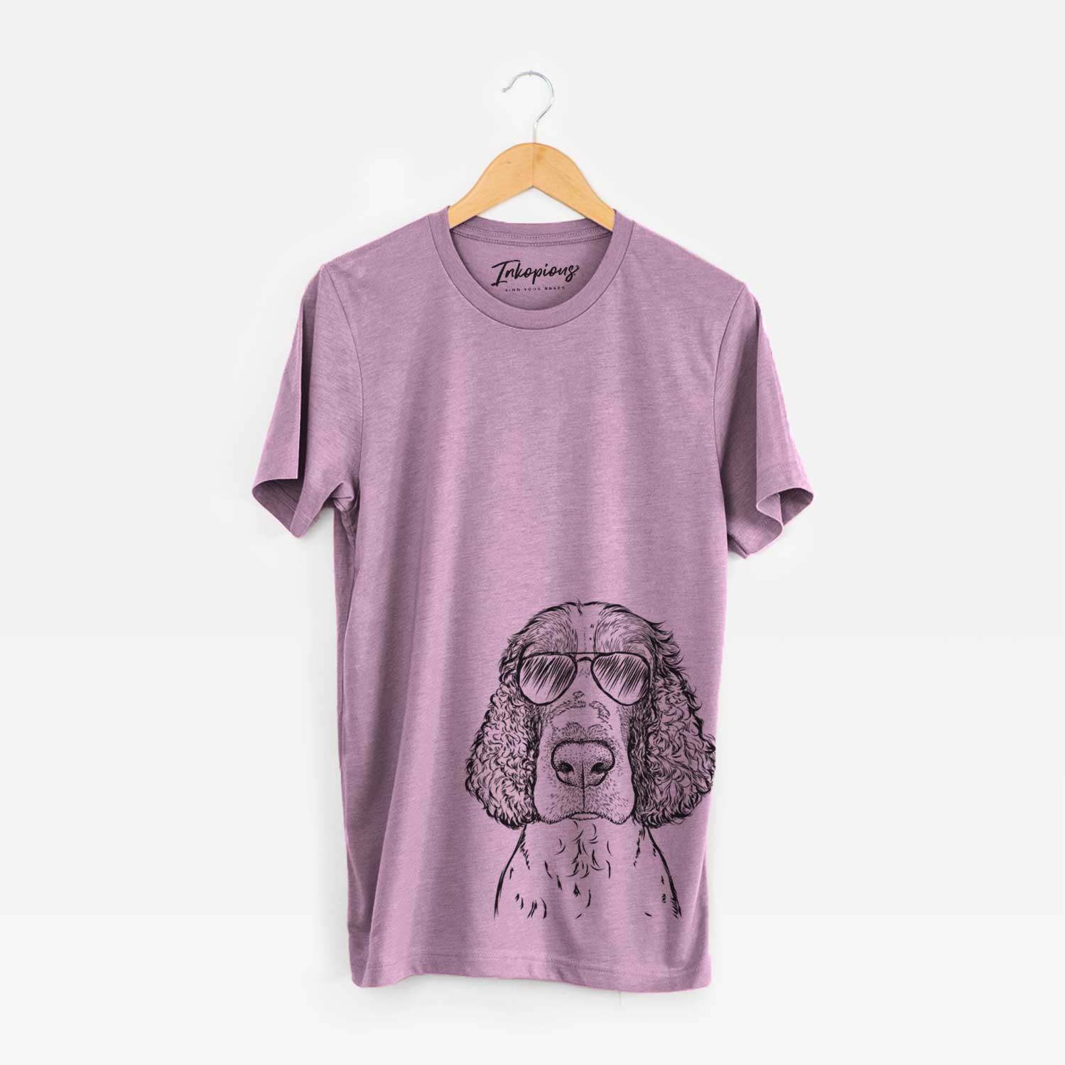 Hand-drawn sketch of Wilbur the English Springer Spaniel wearing aviator sunglasses on an Orchid Bella Canvas Unisex Crewneck