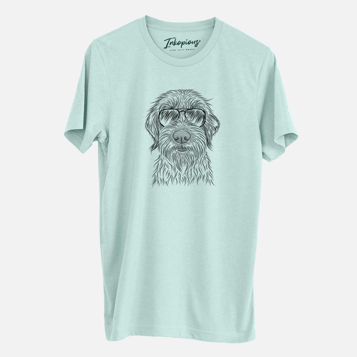 Hand-drawn sketch of Wilkins the Wirehaired Pointing Griffon wearing aviator sunglasses on a Heather Sage Unisex crewneck