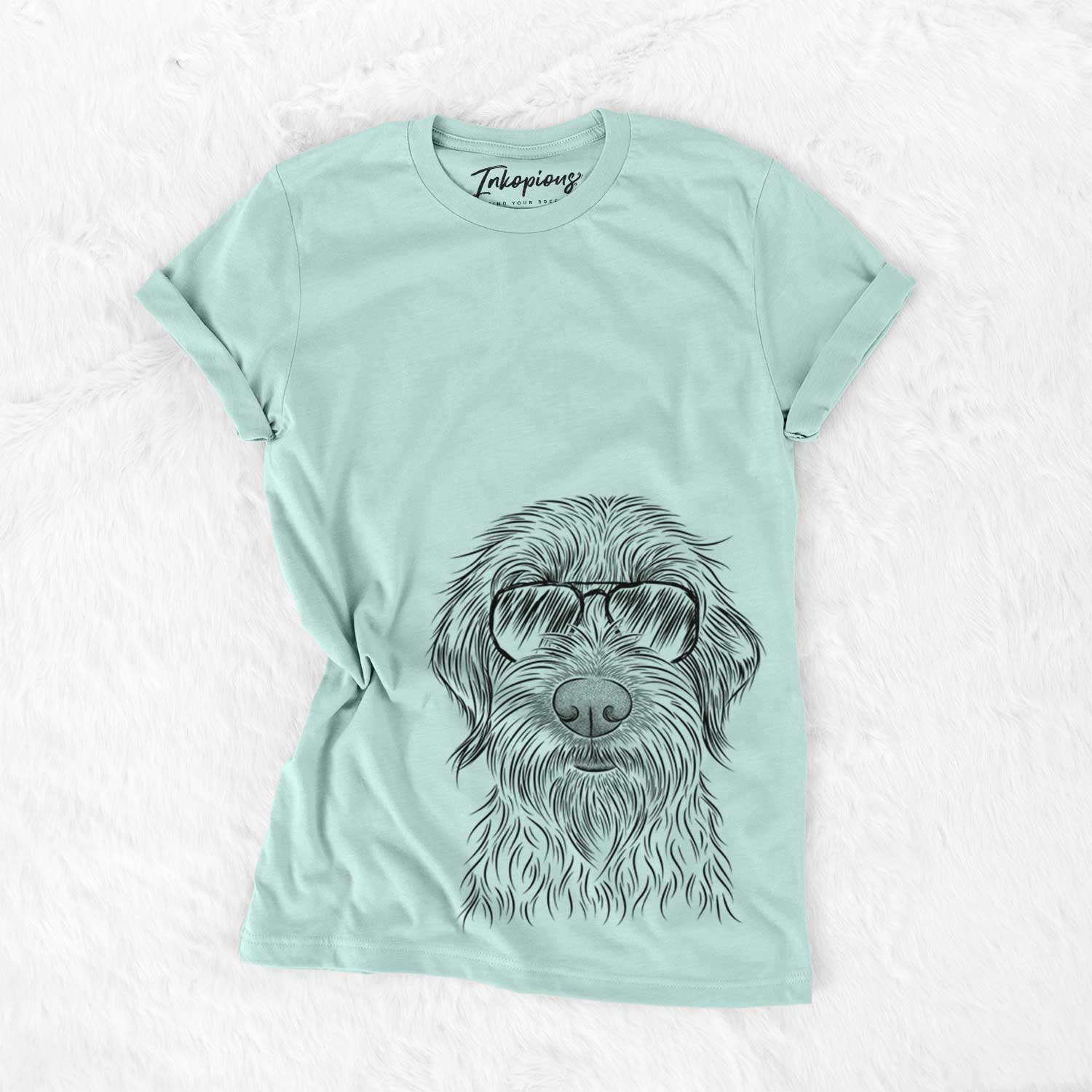 Hand-drawn sketch of Wilkins the Wirehaired Pointing Griffon wearing aviator sunglasses on a Heather Sage Unisex crewneck