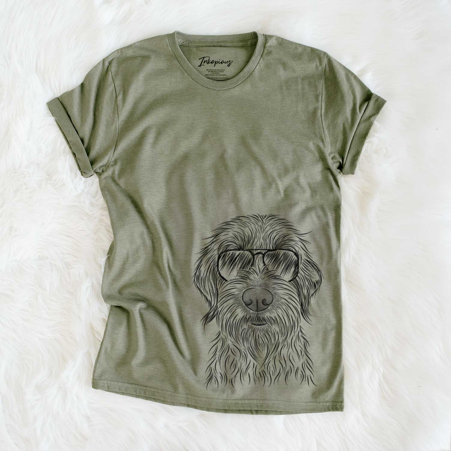 Hand-drawn sketch of Wilkins the Wirehaired Pointing Griffon wearing aviator sunglasses on an Olive Unisex crewneck
