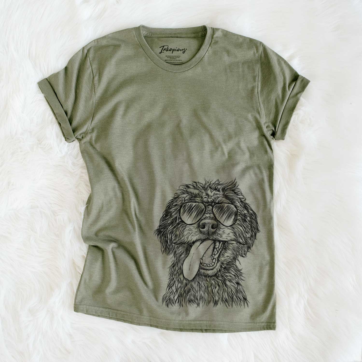Hand-drawn sketch of Winnie the Mini Aussiedoodle wearing aviator sunglasses on an Olive Unisex crewneck