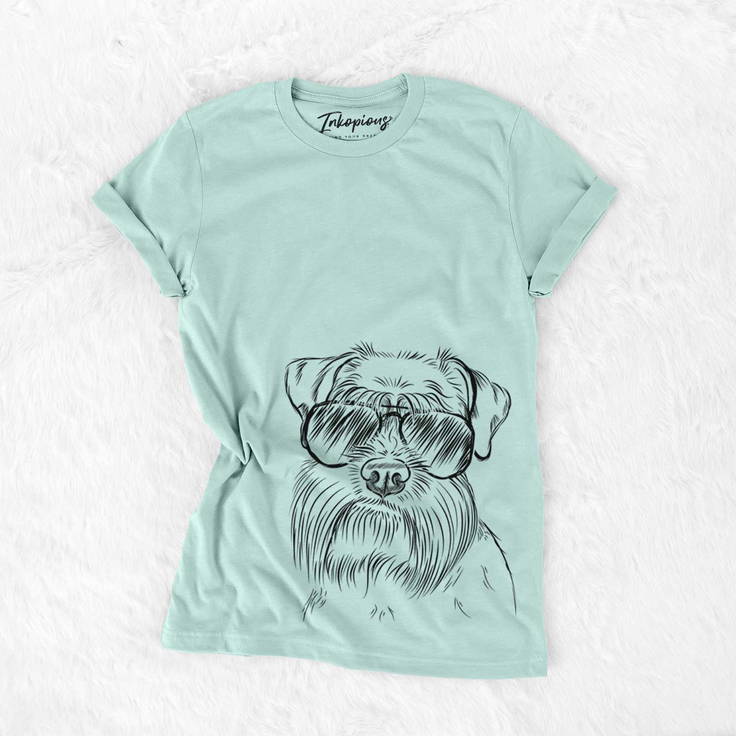 Hand-drawn sketch of Wrigley the Schnauzer wearing aviator sunglasses on a Heather Sage Unisex crewneck