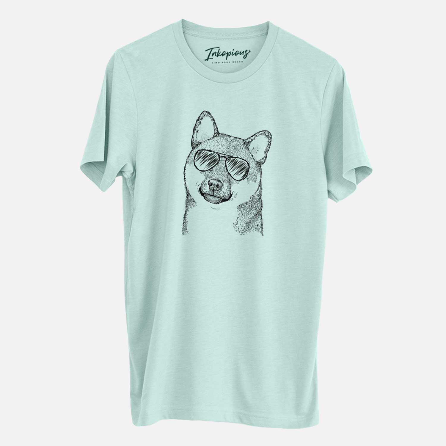 Hand-drawn sketch of Yakuza the Shiba Inu wearing aviator sunglasses on a Heather Sage Unisex crewneck