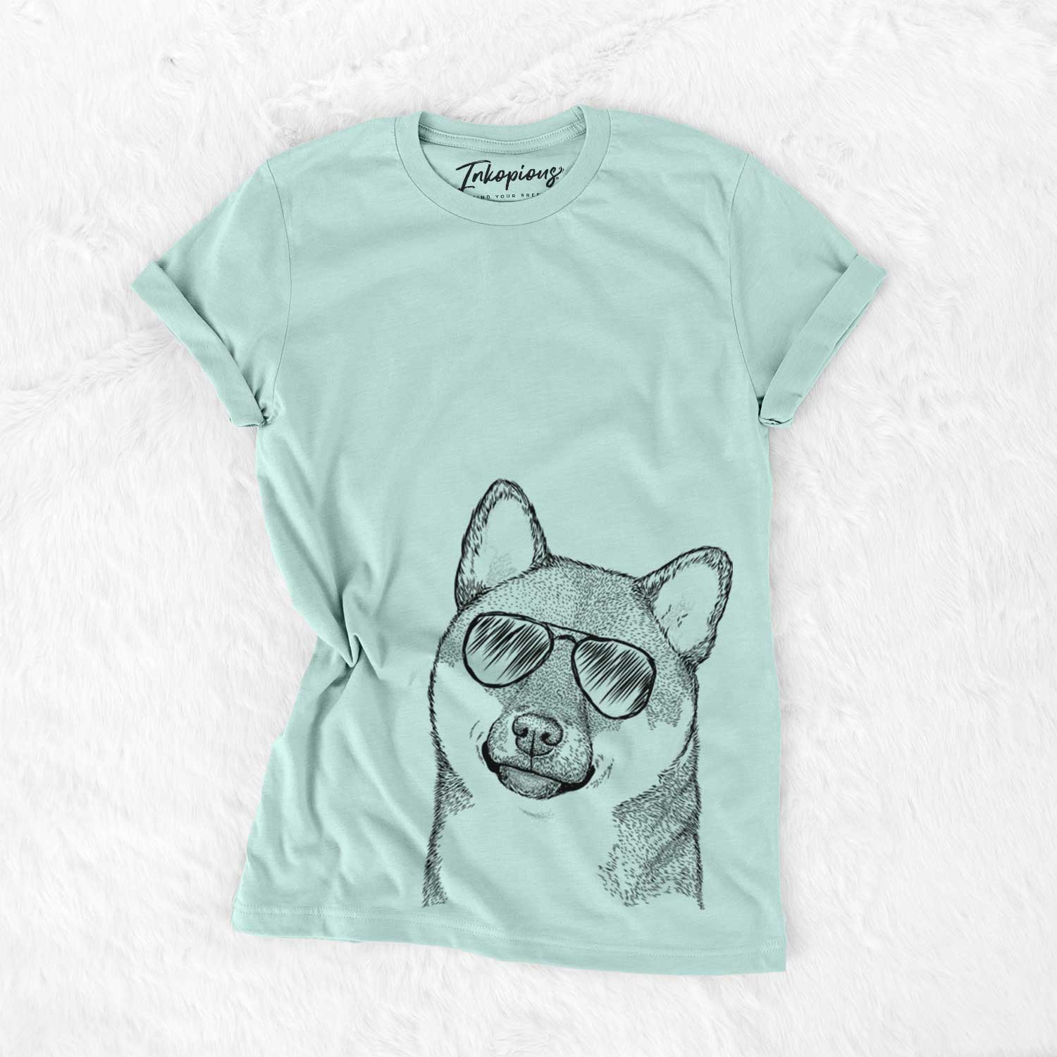 Hand-drawn sketch of Yakuza the Shiba Inu wearing aviator sunglasses on a Heather Sage Unisex crewneck