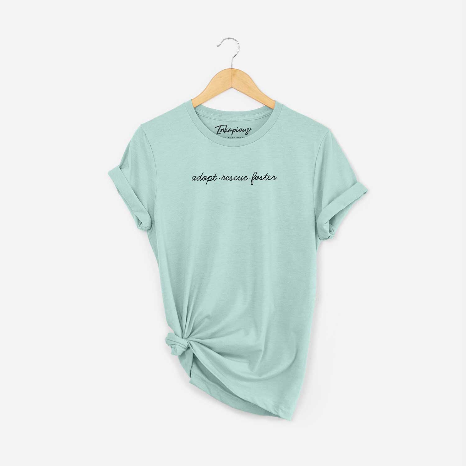 'Adopt - Rescue - Foster' design on a Heather Sage Unisex crewneck