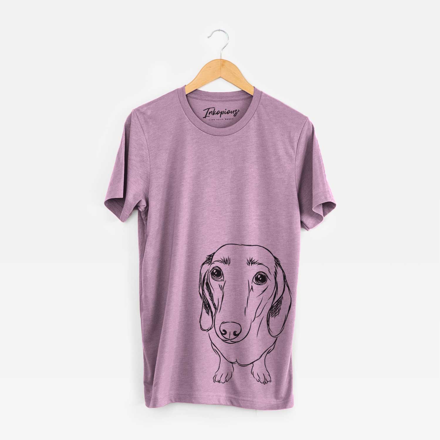 Hand-drawn sketch of Annabelle the Dachshund on an Orchid Bella Canvas Unisex Crewneck