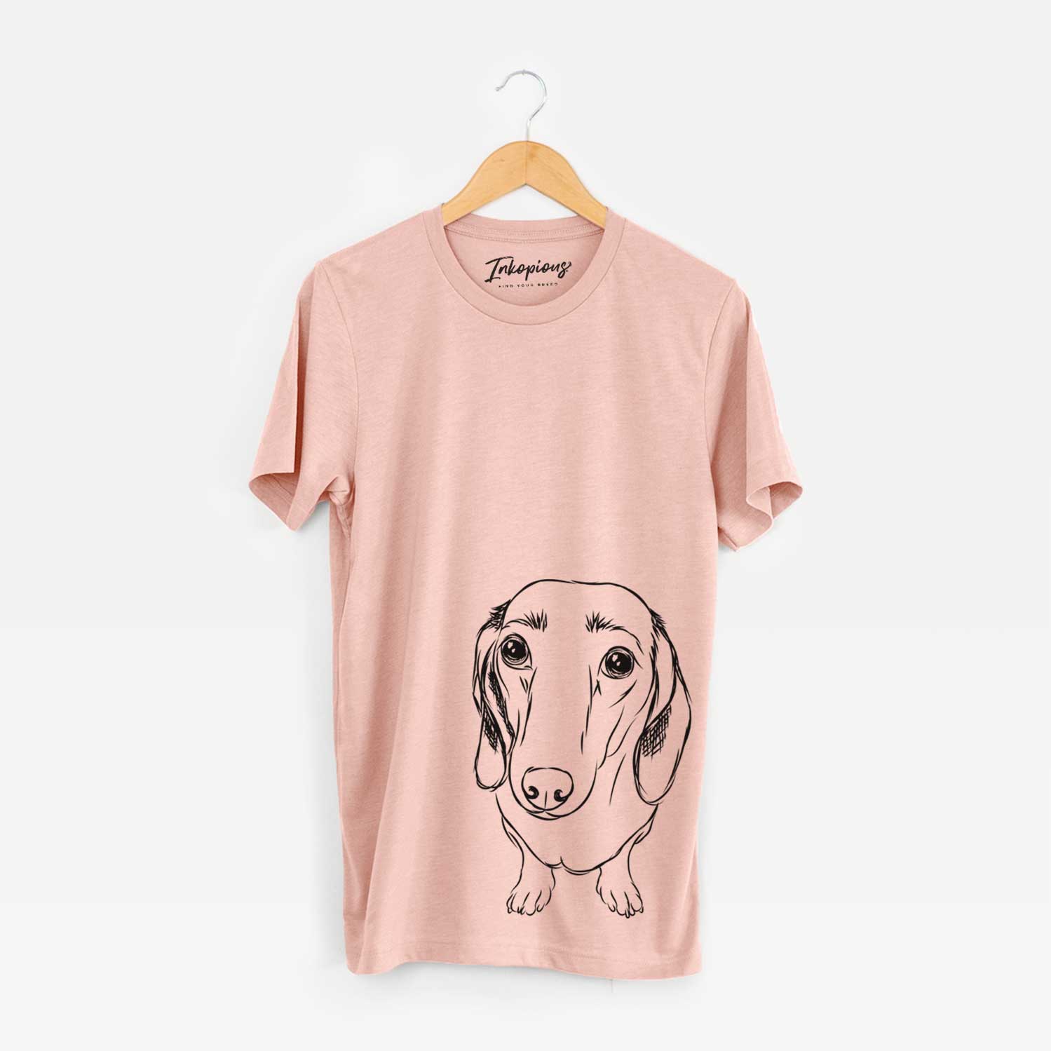 Hand-drawn sketch of Annabelle the Dachshund on a Peach Unisex crewneck