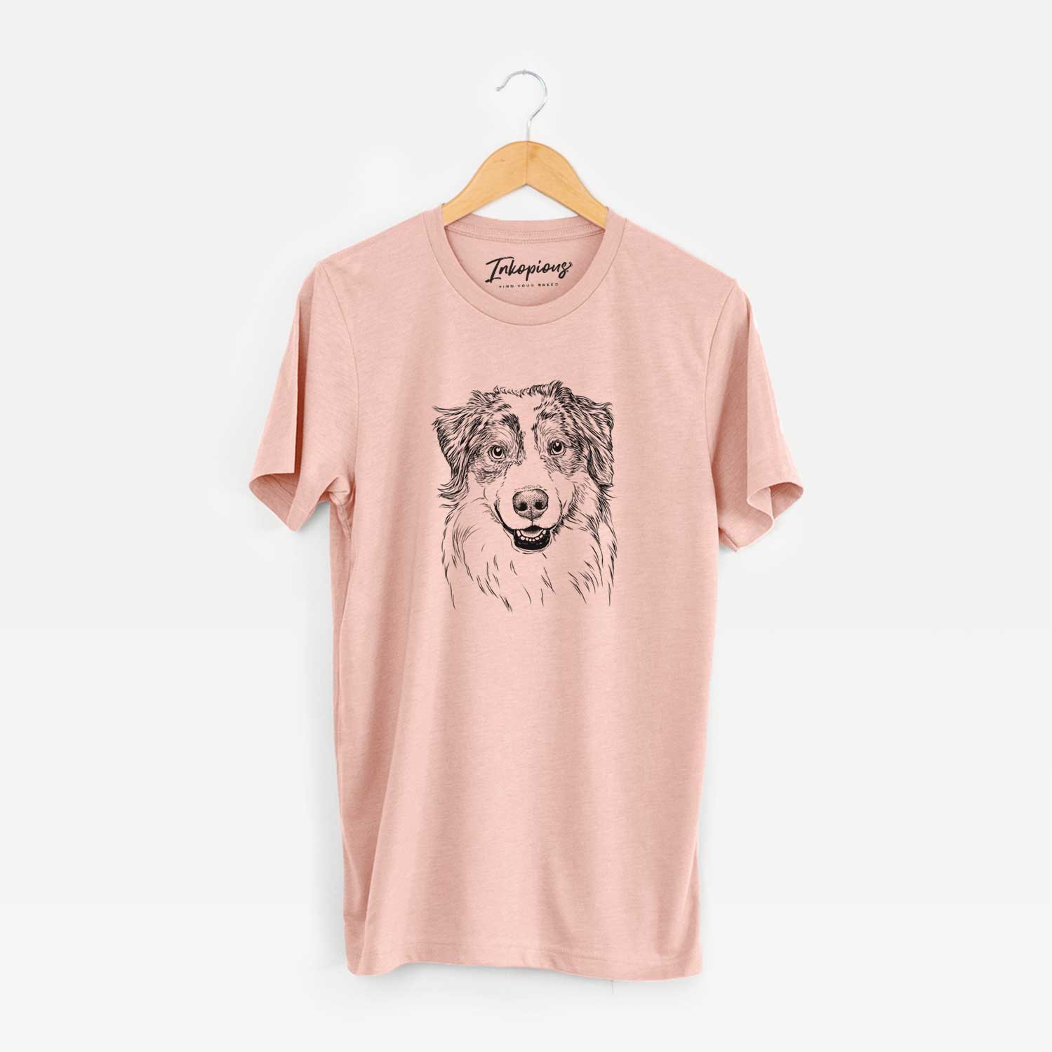 Hand-drawn sketch of Aonghus the Australian Shepherd on a Peach Unisex crewneck