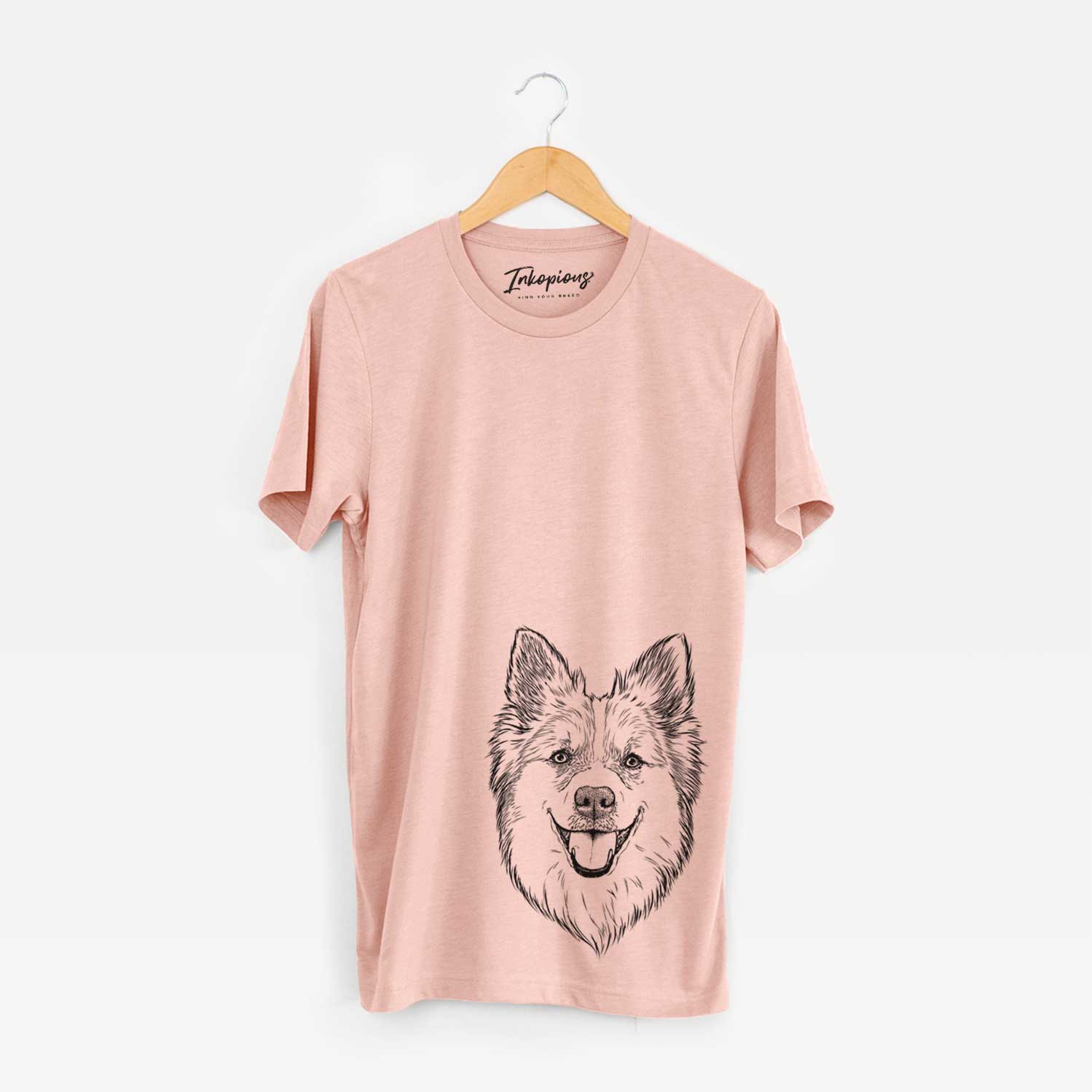 Hand-drawn sketch of Ari the Icelandic Sheepdog on a Peach Unisex crewneck