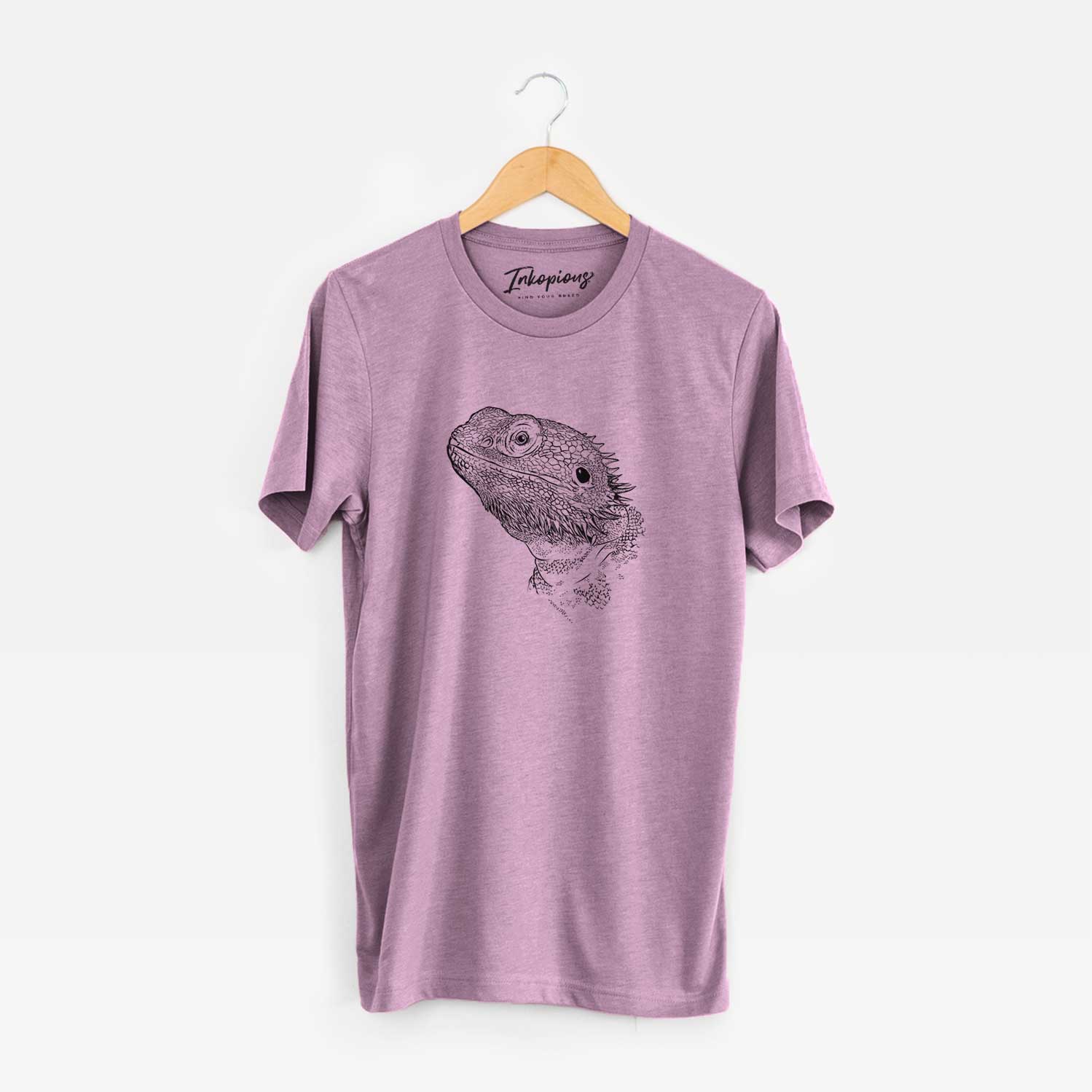 Hand-drawn sketch of Ash the Bearded Dragon on an Orchid Unisex crewneck