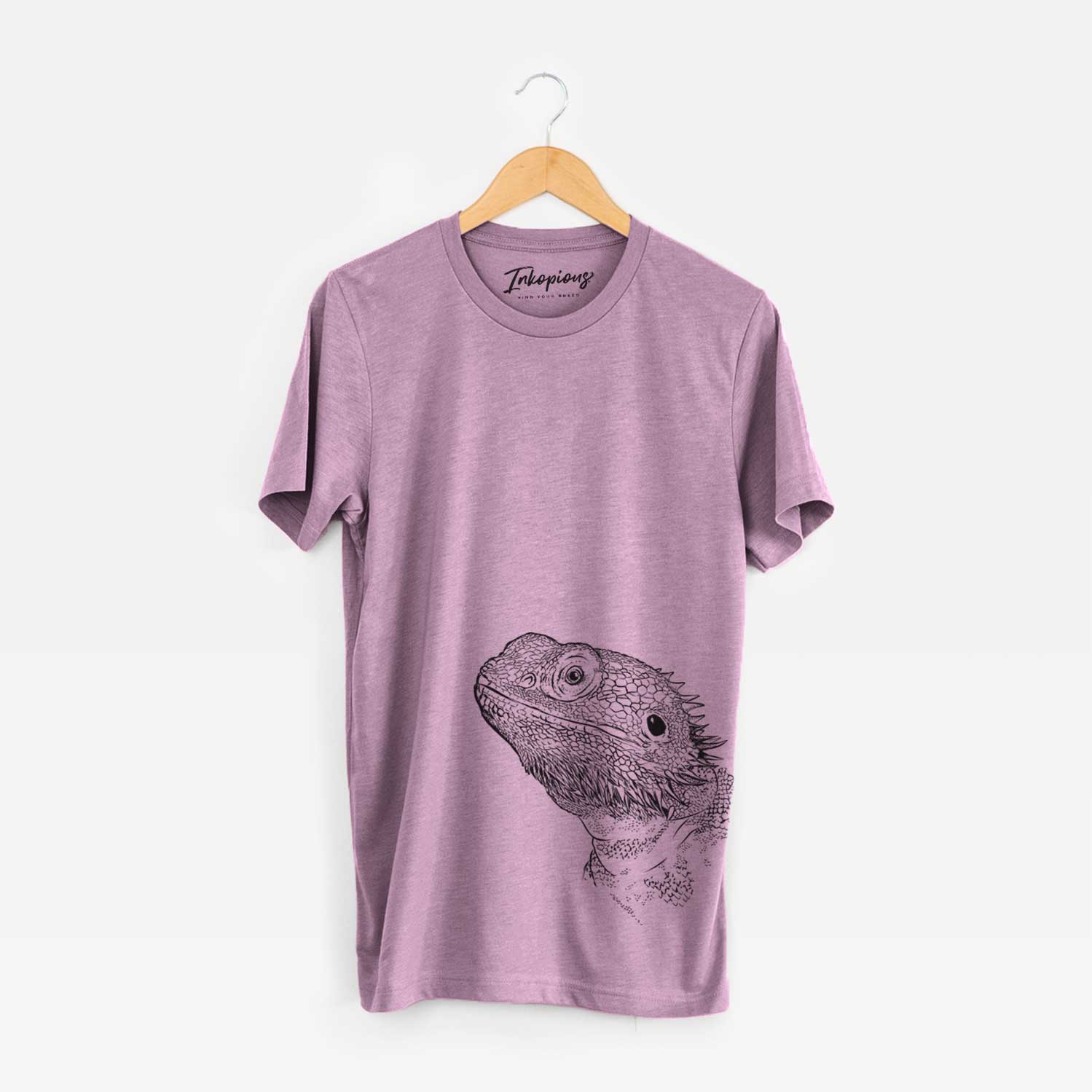 Hand-drawn sketch of Ash the Bearded Dragon on an Orchid Unisex crewneck
