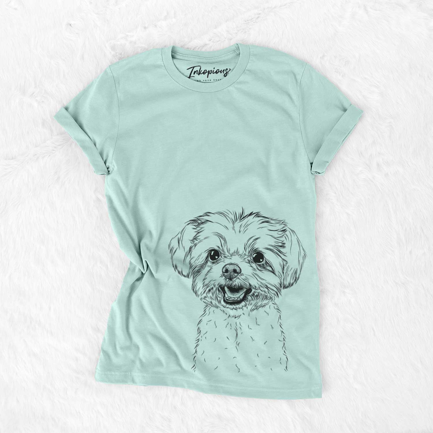 Hand-drawn sketch of Aspen the Morkie on a Heather Sage Unisex crewneck