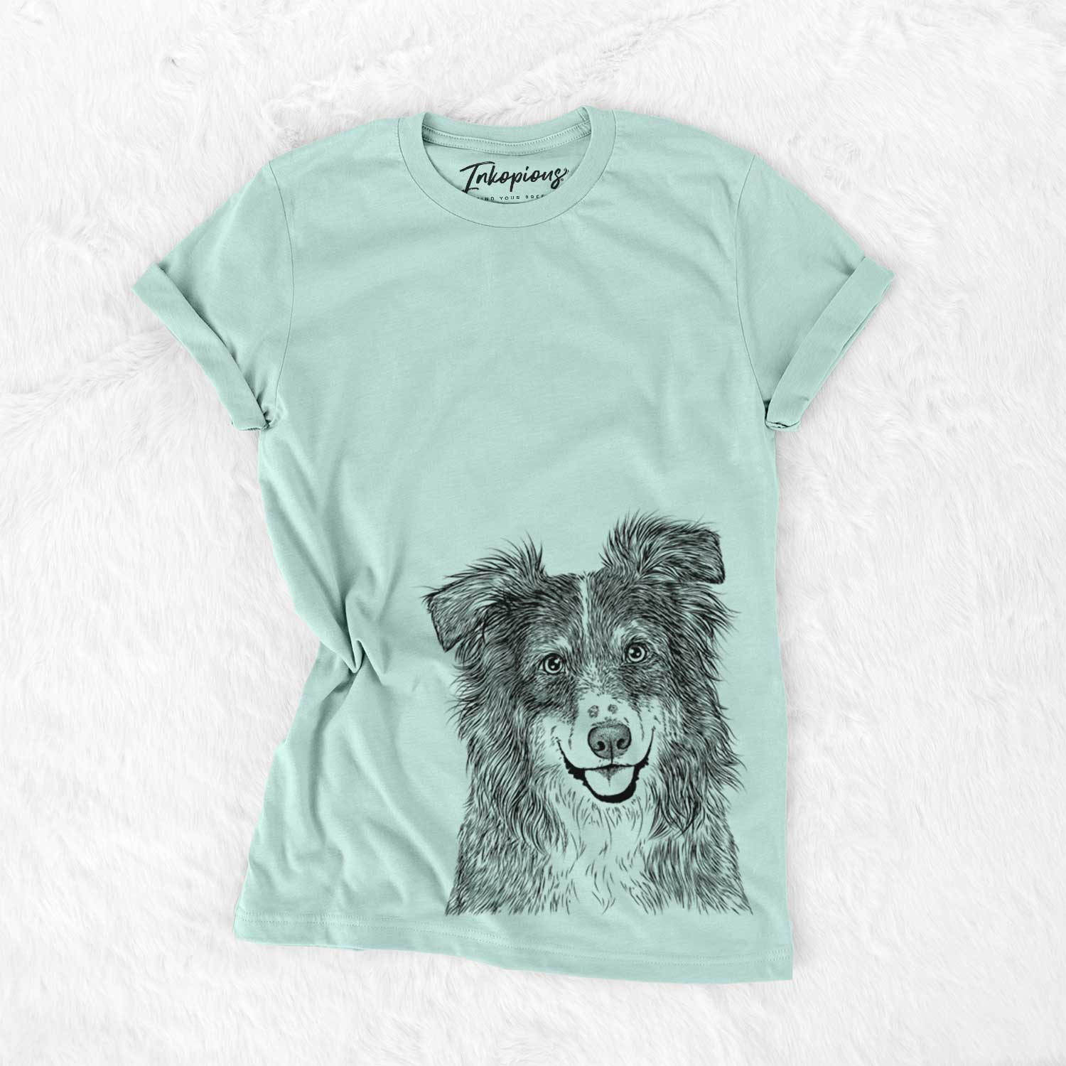 Hand-drawn sketch of Aushe the Australian Shepherd on a Heather Sage Unisex crewneck