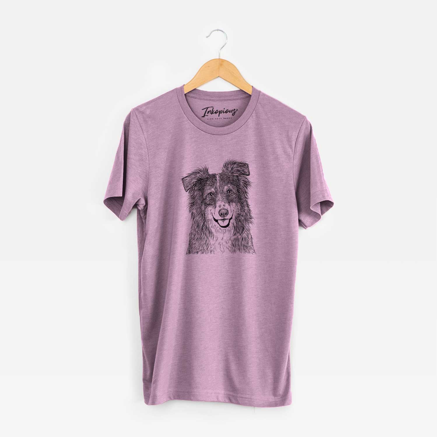 Hand-drawn sketch of Aushe the Australian Shepherd on an Orchid Unisex crewneck