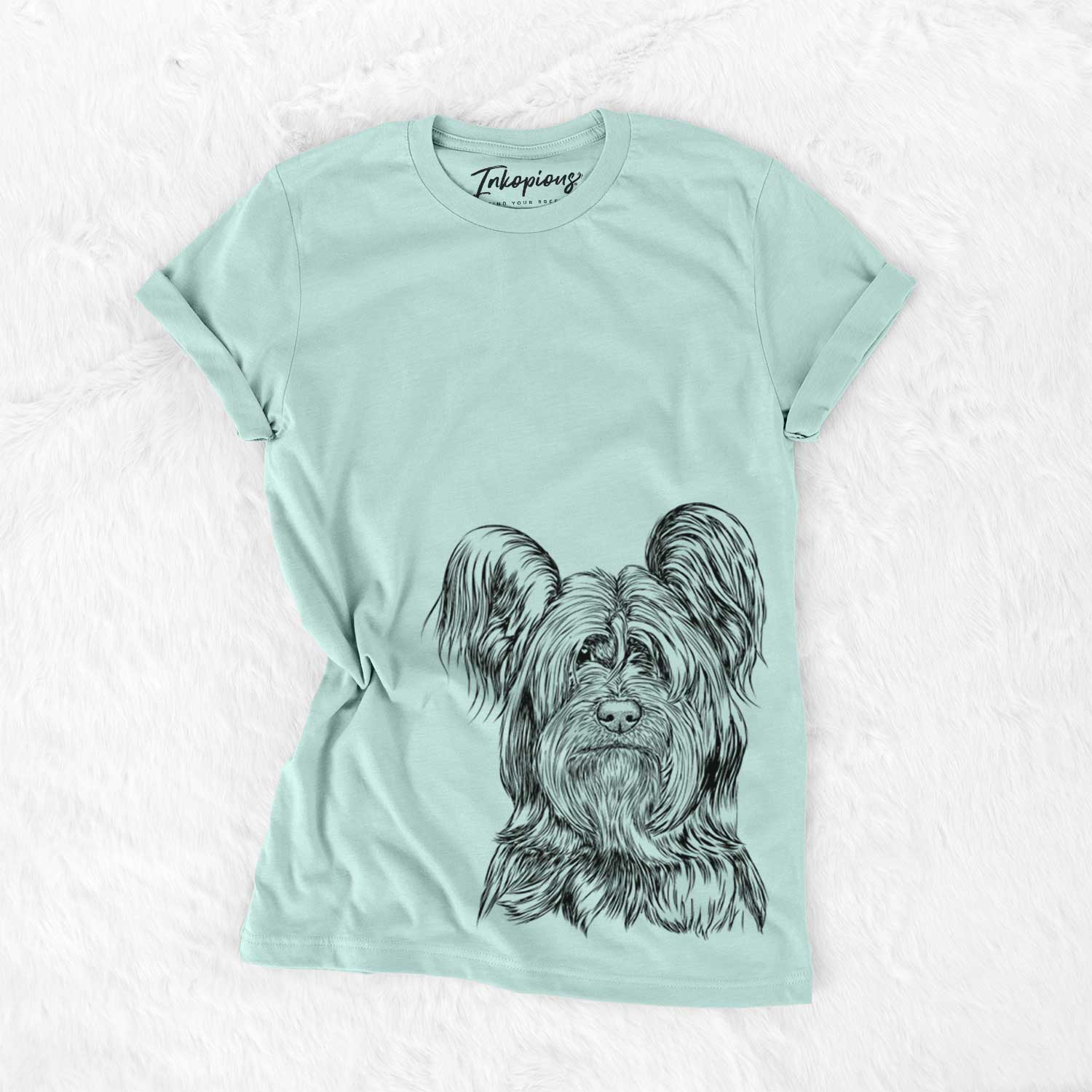 Hand-drawn sketch of Bandit the Skye Terrier on a Heather Sage Unisex crewneck