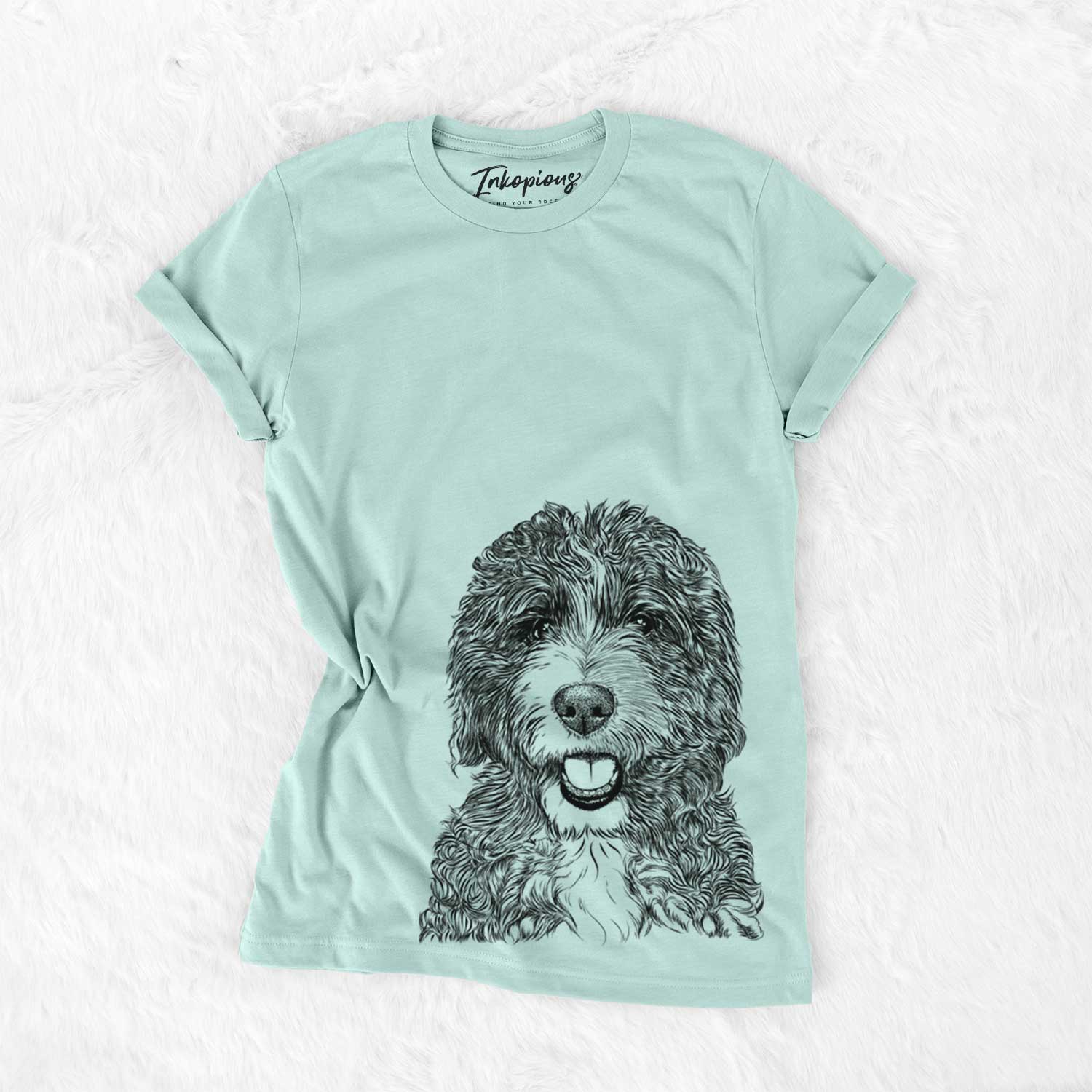 Hand-drawn sketch of Bash the Bernedoodle on a Heather Sage Bella Canvas Unisex Crewneck