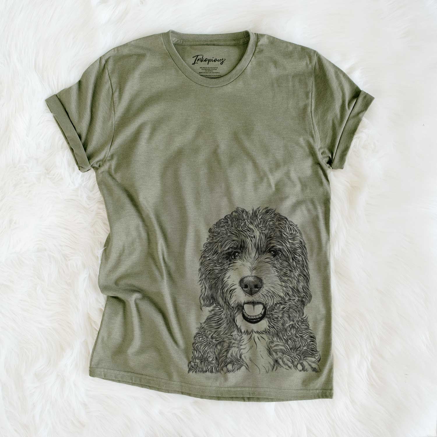 Hand-drawn sketch of Bash the Bernedoodle on an Olive Unisex crewneck