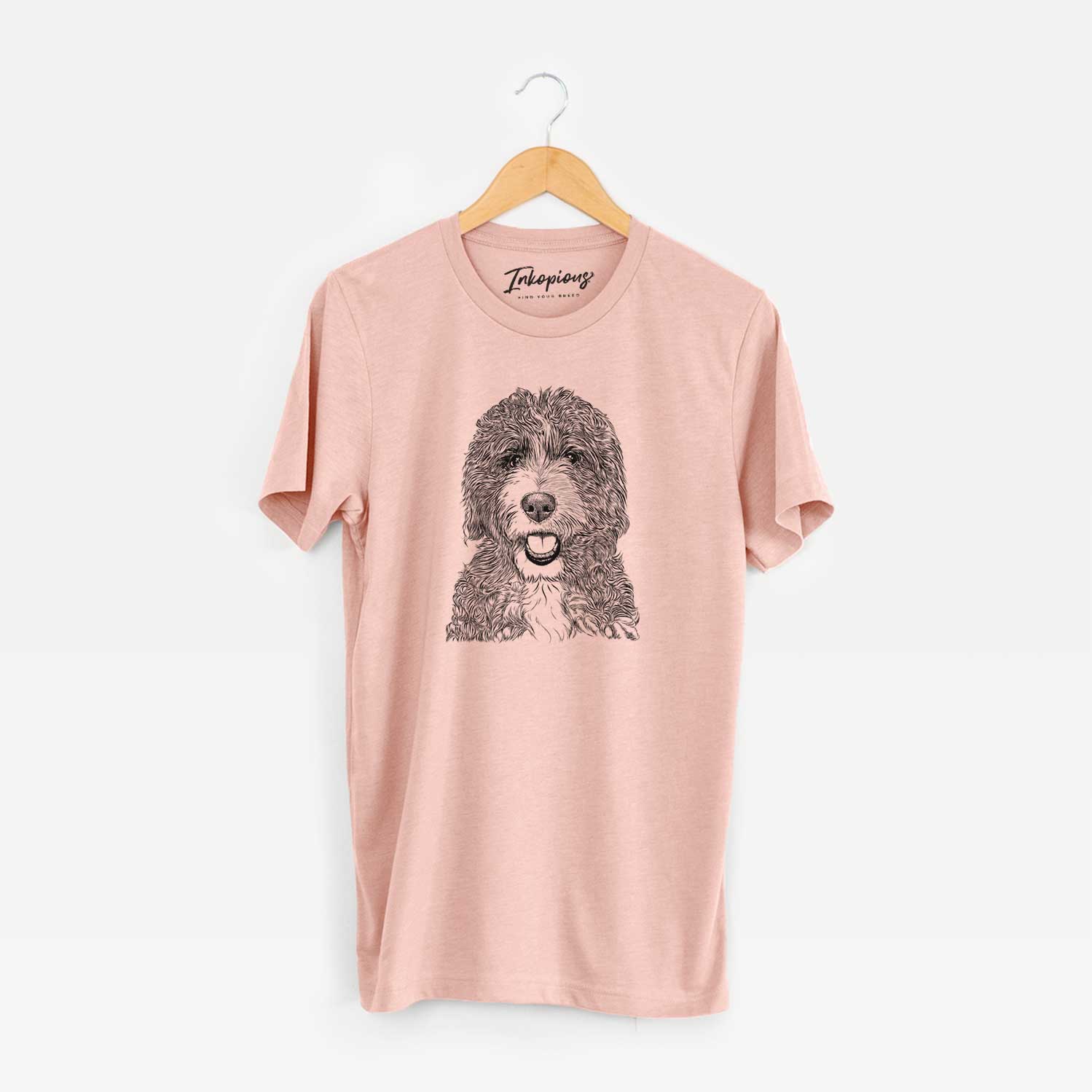 Hand-drawn sketch of Bash the Bernedoodle on a Peach Unisex crewneck