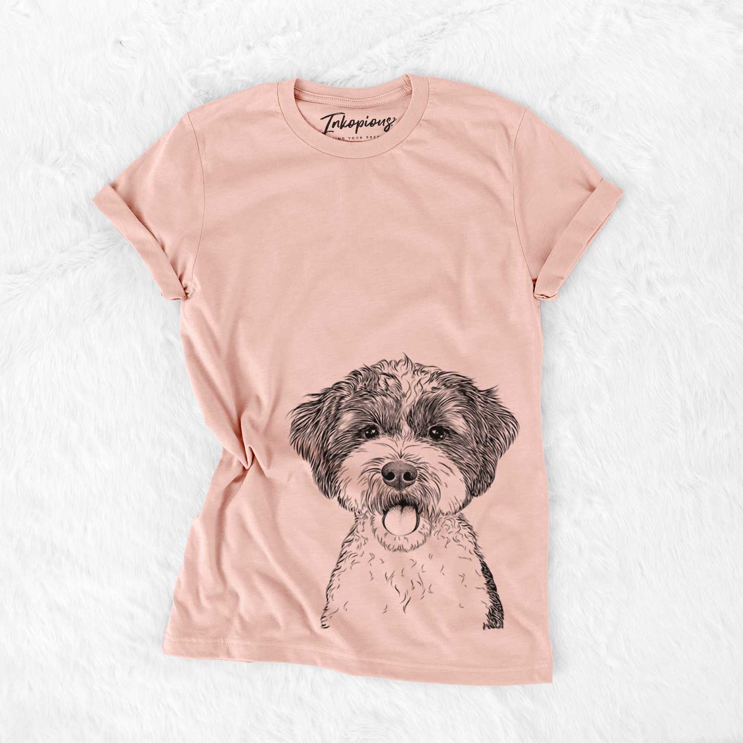 Hand-drawn sketch of Bella the Cockapoo on a Peach Bella Canvas Unisex Crewneck