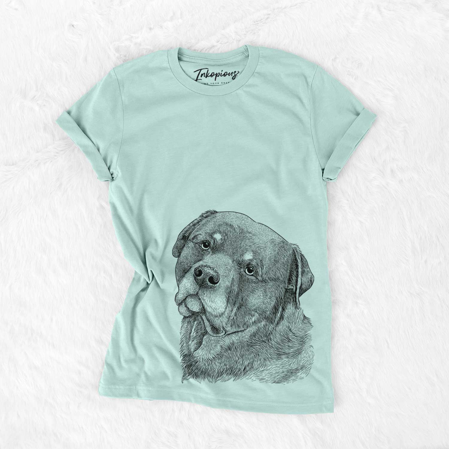 Hand-drawn sketch of Bender the Rottweiler on a Heather Sage Bella Canvas Unisex Crewneck