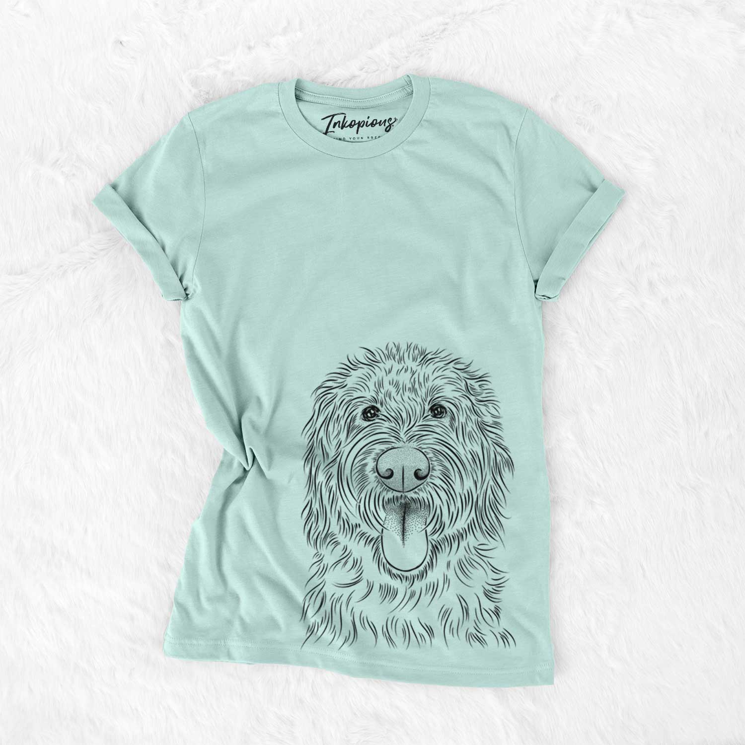 Hand-drawn sketch of Bennett the Doodle on a Heather Sage Unisex crewneck