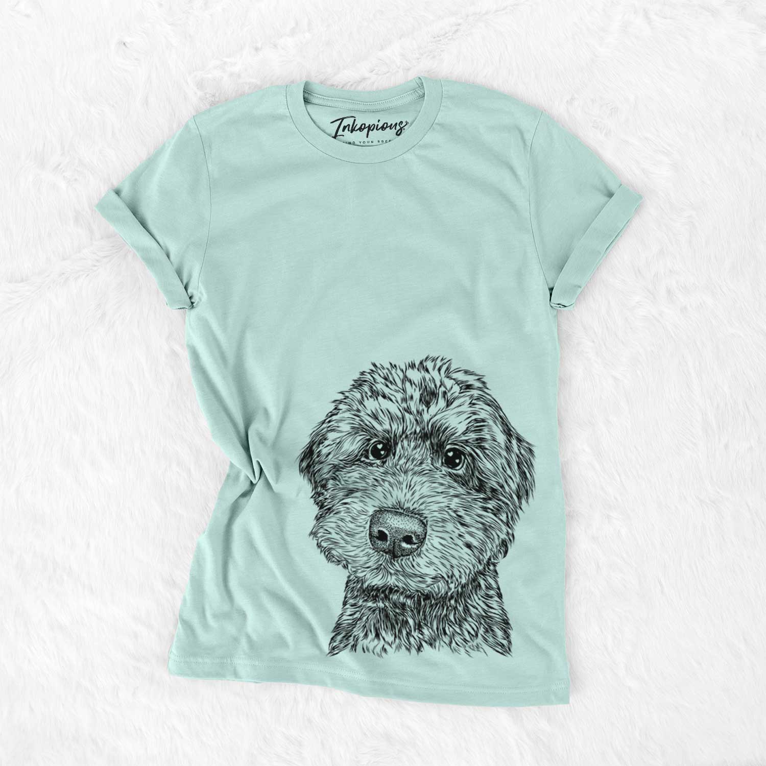 Hand-drawn sketch of Bowser the Whoodle on a Heather Sage Unisex crewneck