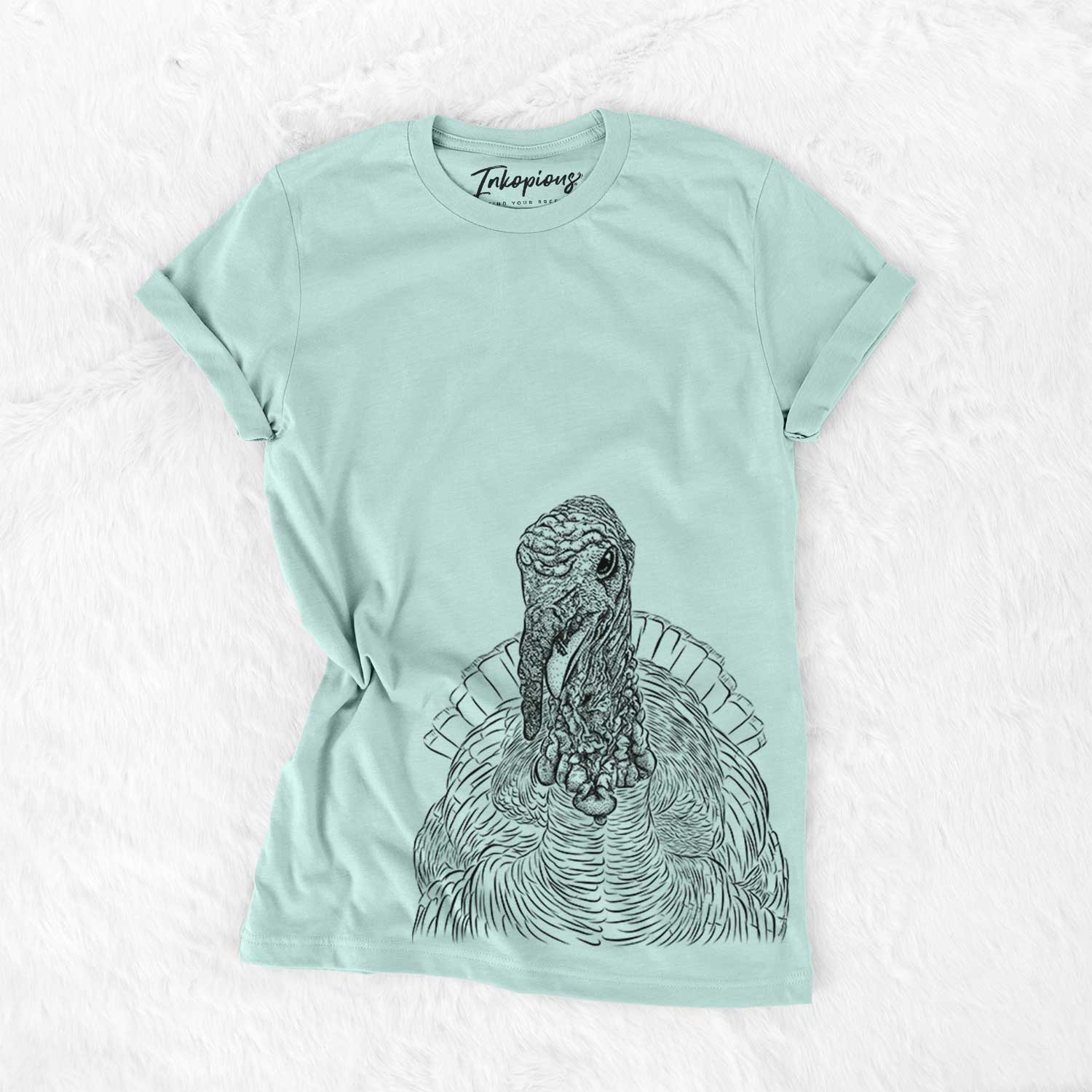 Hand-drawn sketch of Brady the Turkey on a Heather Sage Bella Canvas Unisex Crewneck