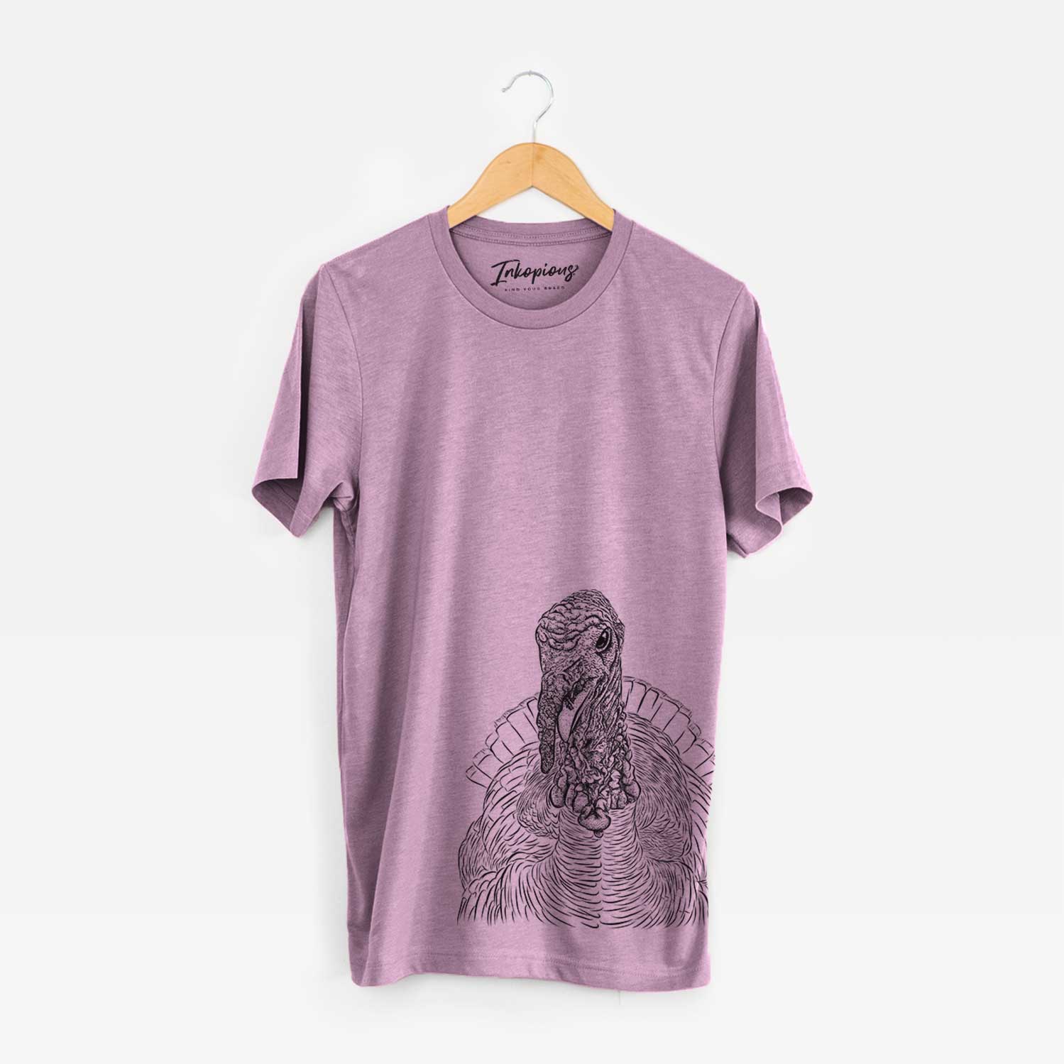 Hand-drawn sketch of Brady the Turkey on an Orchid Bella Canvas Unisex Crewneck