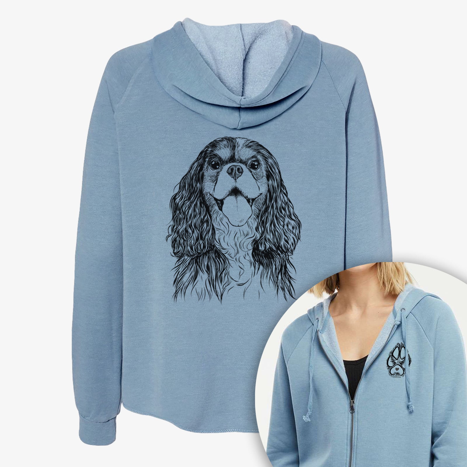Hand-drawn sketch of Brandy the Cavalier King Charles Spaniel on a Women's cali wave zip-up sweatshirt, shown with icons of the other available costume styles