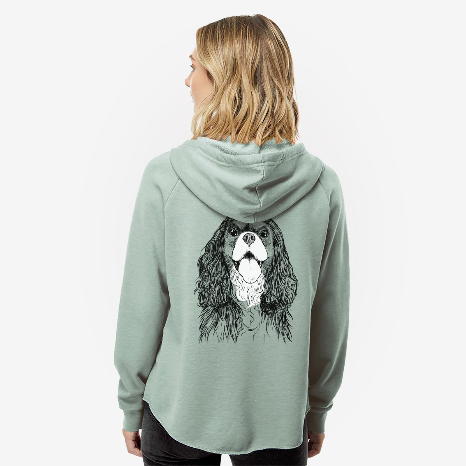Hand-drawn sketch of Brandy the Cavalier King Charles Spaniel on a Sage Women's cali wave zip-up sweatshirt