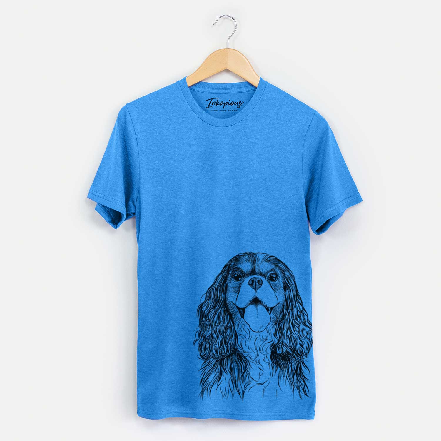 Hand-drawn sketch of Brandy the Cavalier King Charles Spaniel on a Blue Unisex crewneck