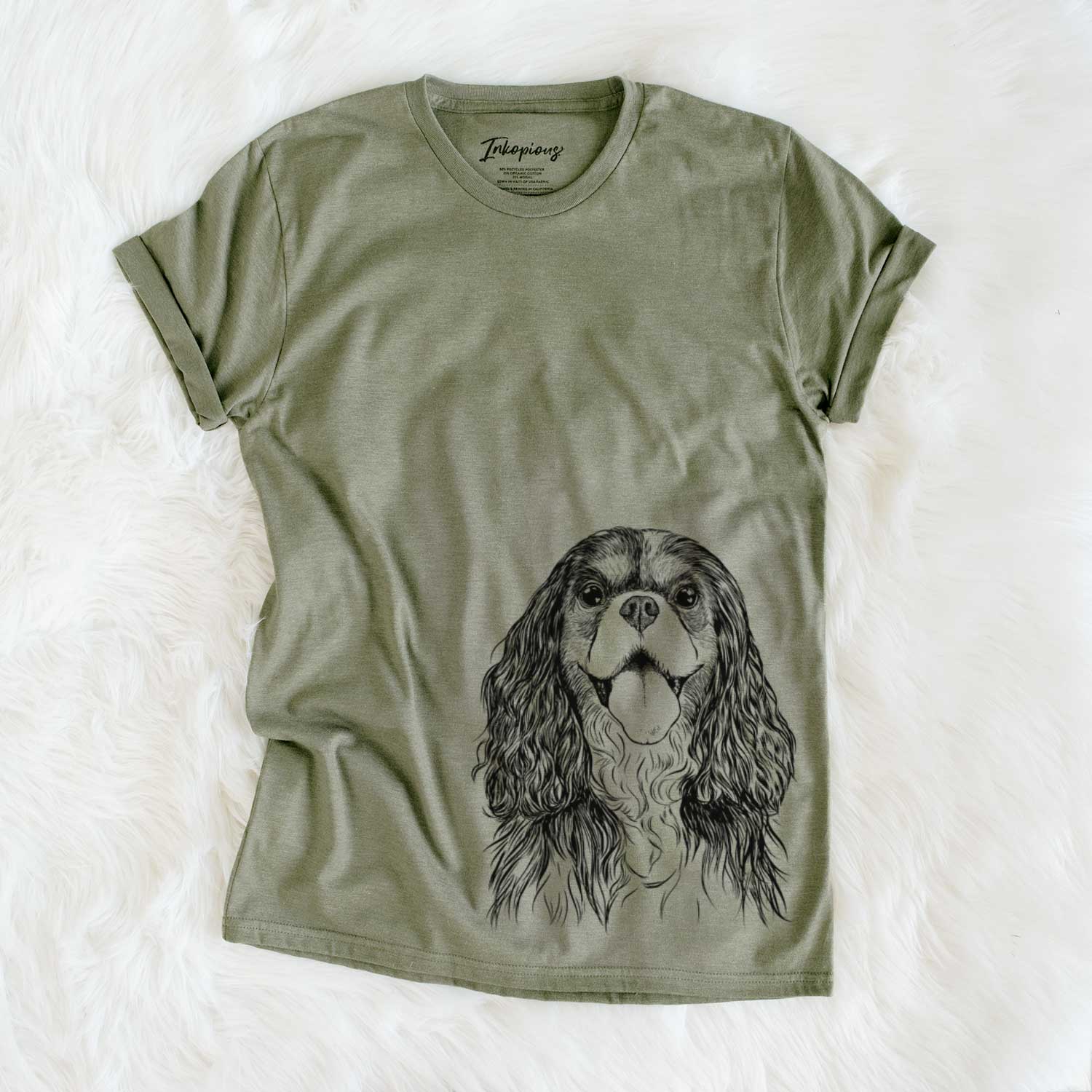Hand-drawn sketch of Brandy the Cavalier King Charles Spaniel on an Olive Unisex crewneck