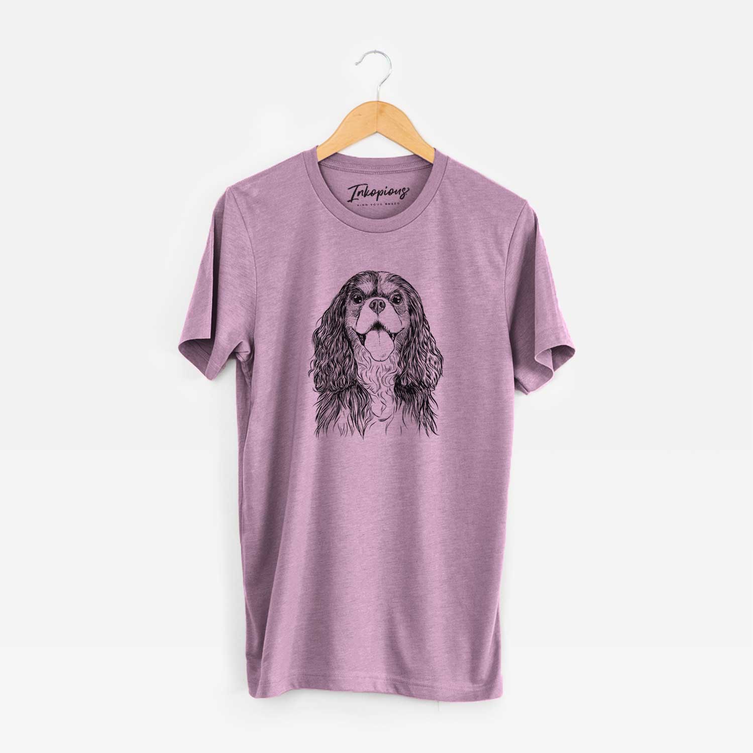 Hand-drawn sketch of Brandy the Cavalier King Charles Spaniel on an Orchid Unisex crewneck