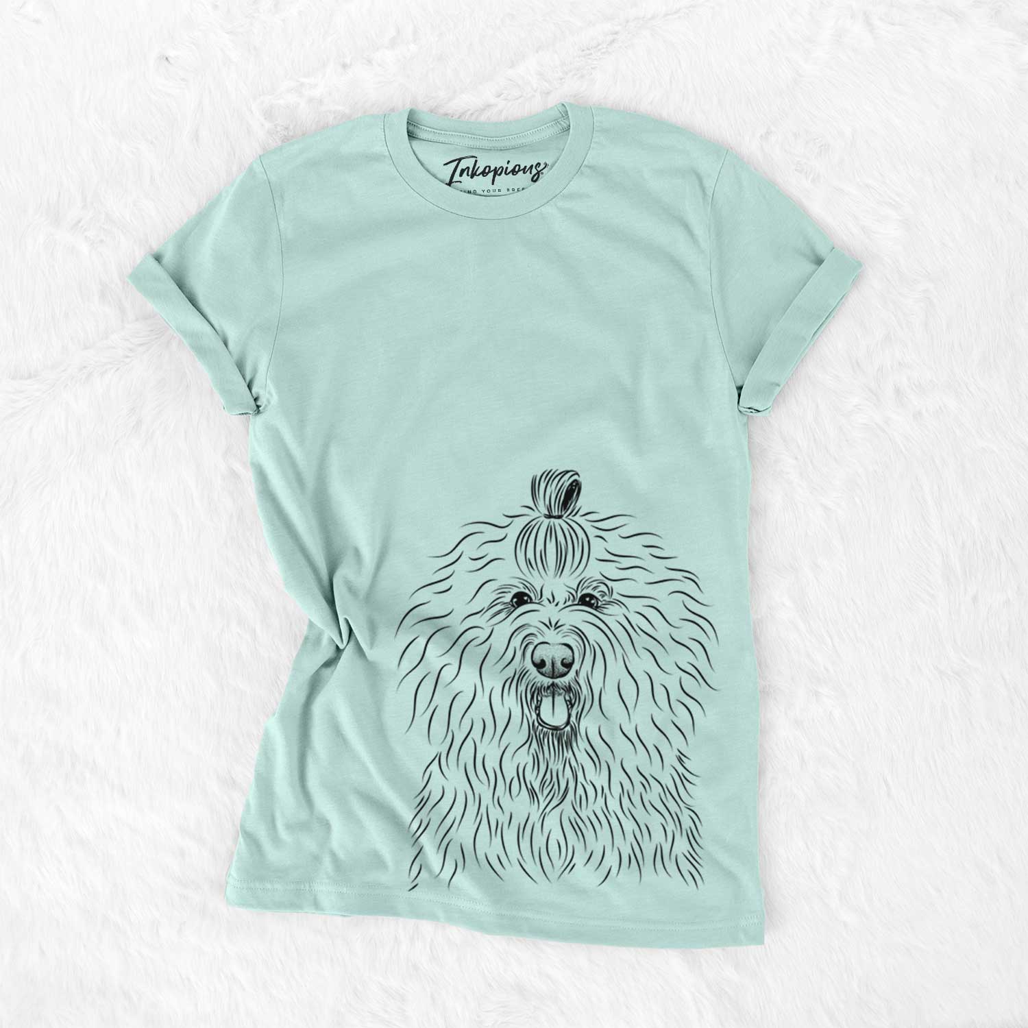 Hand-drawn sketch of Brody the Old English Sheepdog on a Heather Sage Unisex crewneck