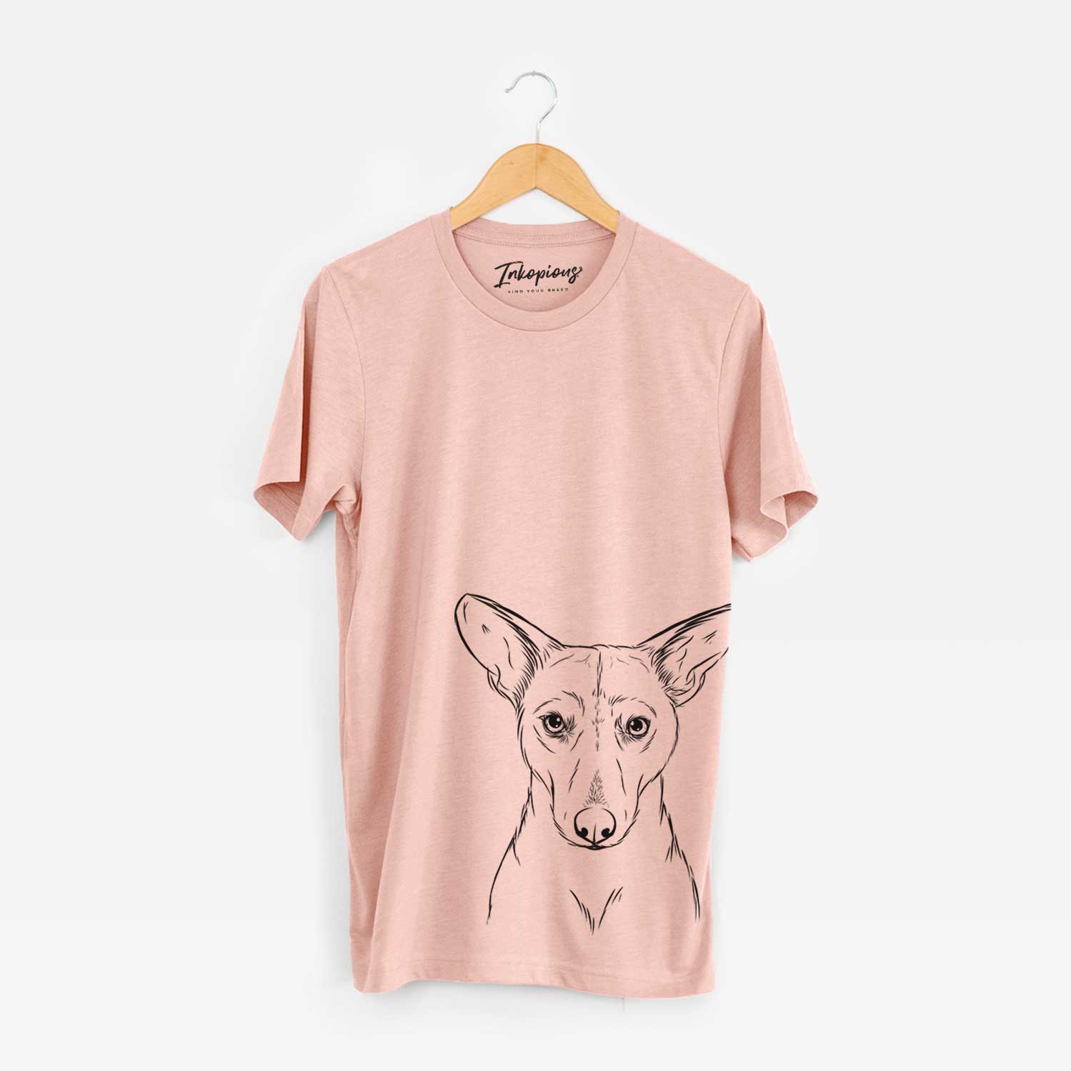 Hand-drawn sketch of Buff the Dorgi on a Peach Bella Canvas Unisex Crewneck